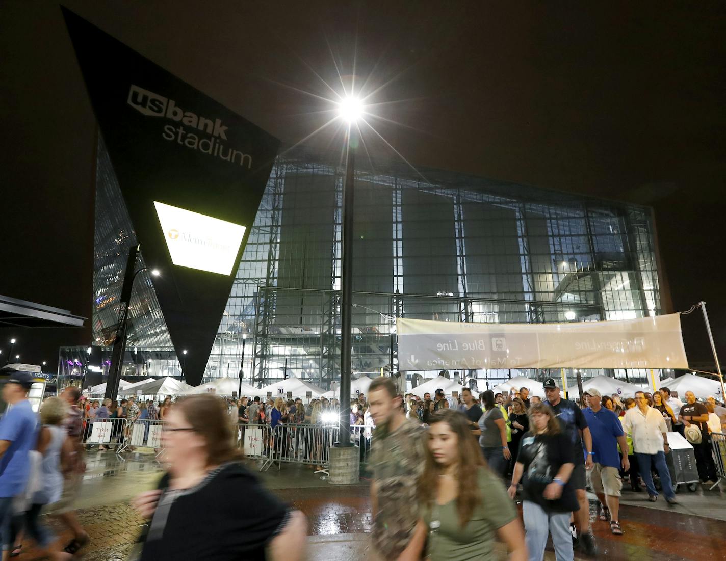 People made their way to the light rail after a Luke Bryan concert at US Bank Stadium on Friday night. ] CARLOS GONZALEZ cgonzalez@startribune.com - August 19, 2016, Minneapolis, MN, First Concert at US Bank Stadium, Dustin Lynch, Little Big Town, Luke Bryan