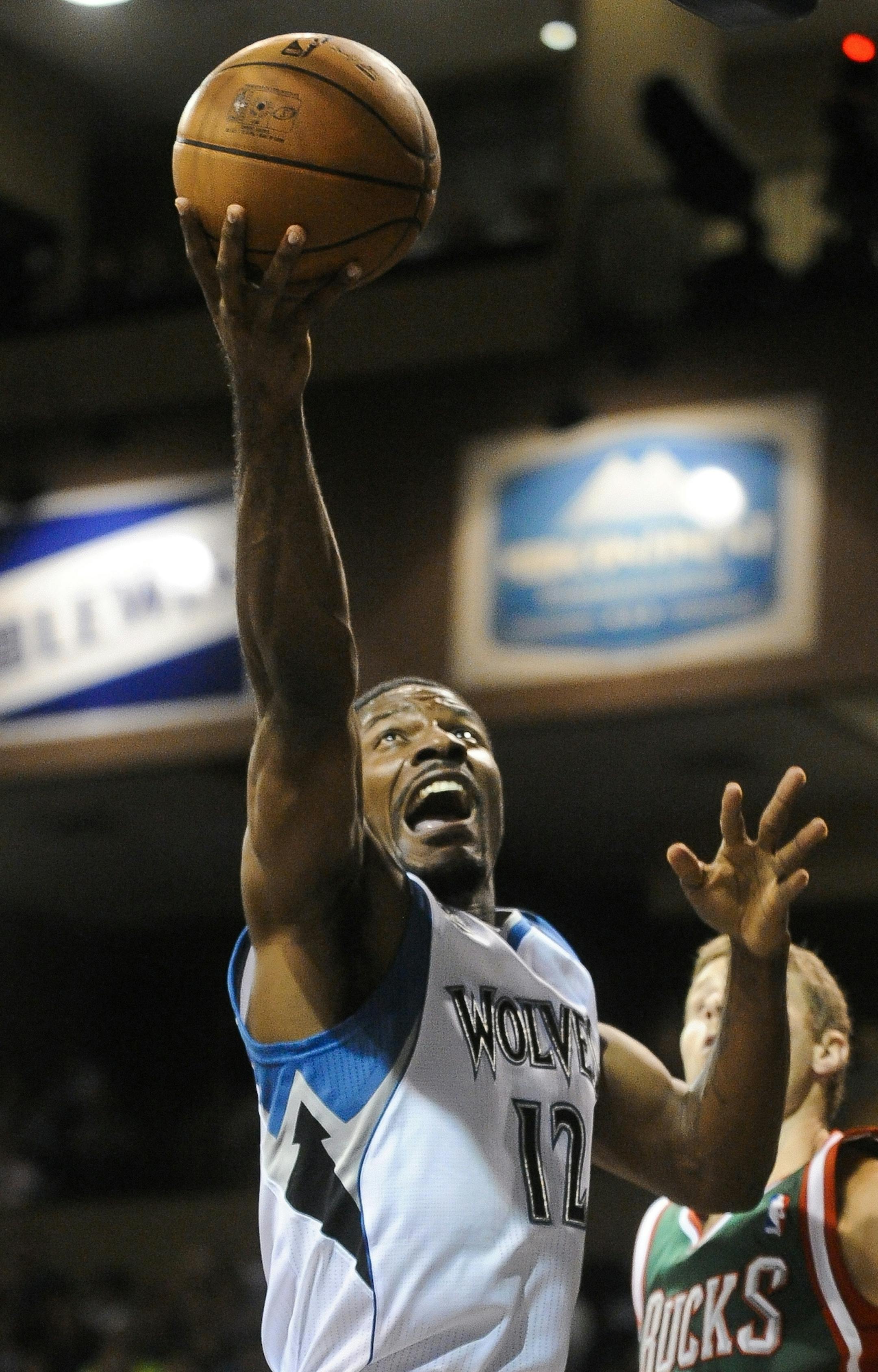 Minnesota Timberwolves shooting guard Othyus Jeffers (12) takes a shot during their Thursday Oct 10, 2013 NBA game against the Milwaukee Bucks in Sioux Falls, SD.(AP Photo/Dave Weaver) ORG XMIT: NEDW909