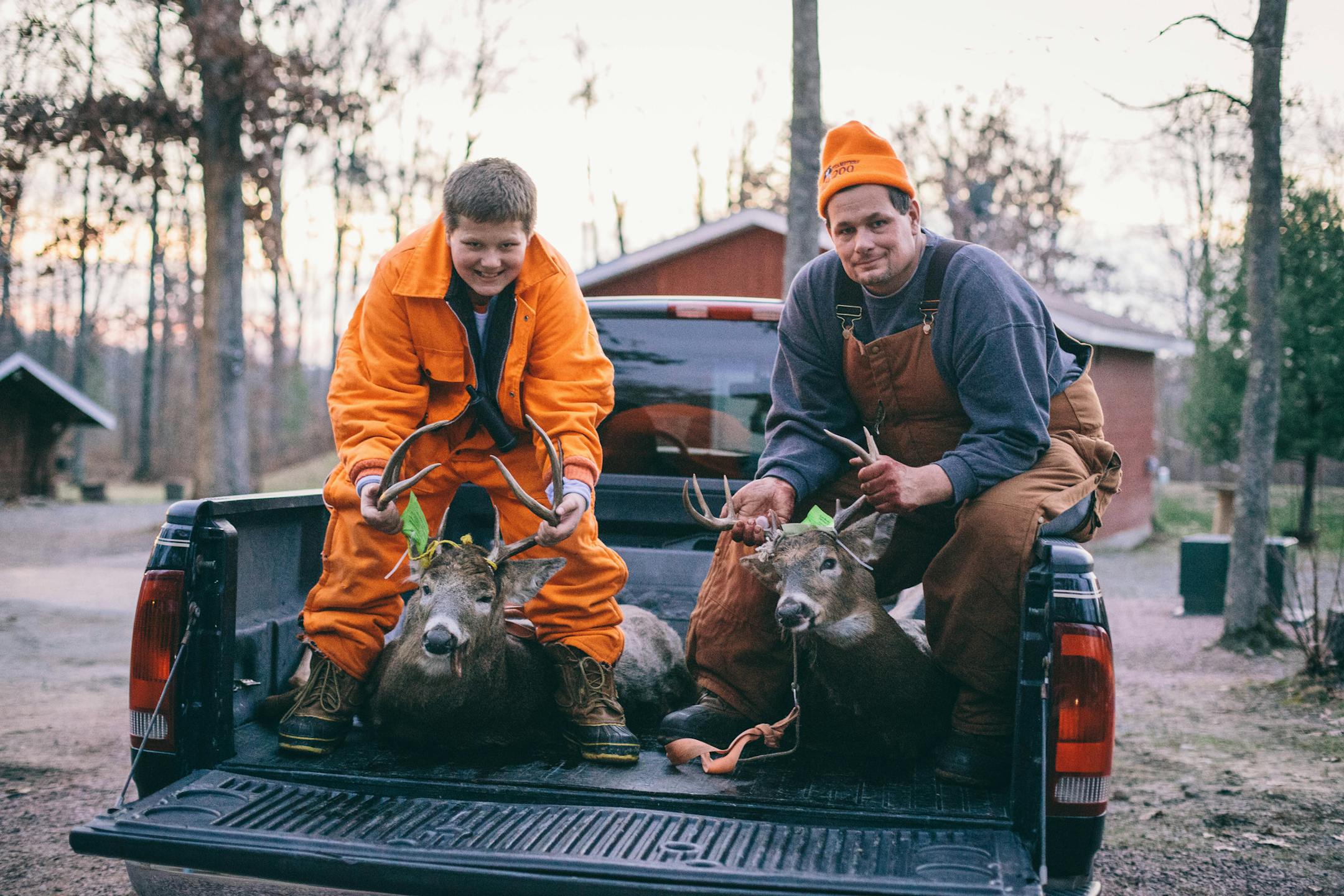 A father and son happily displayed their bucks shot in the Clark County (Wis.) Forest.