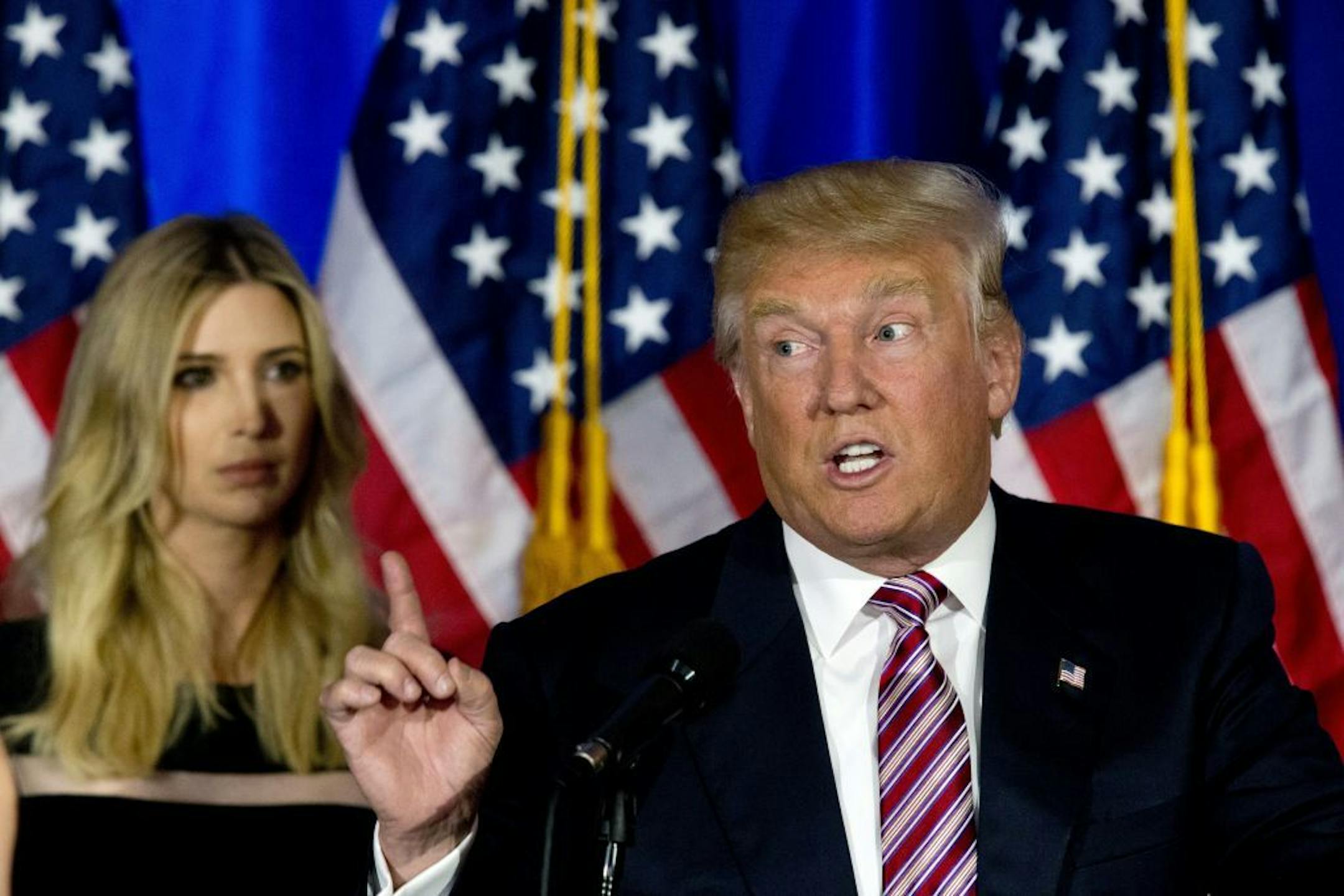 Republican presidential candidate Donald Trump is joined by his daughter Ivanka as he speaks during a news conference at the Trump National Golf Club Westchester, Tuesday, June 7, 2016, in Briarcliff Manor, N.Y.
