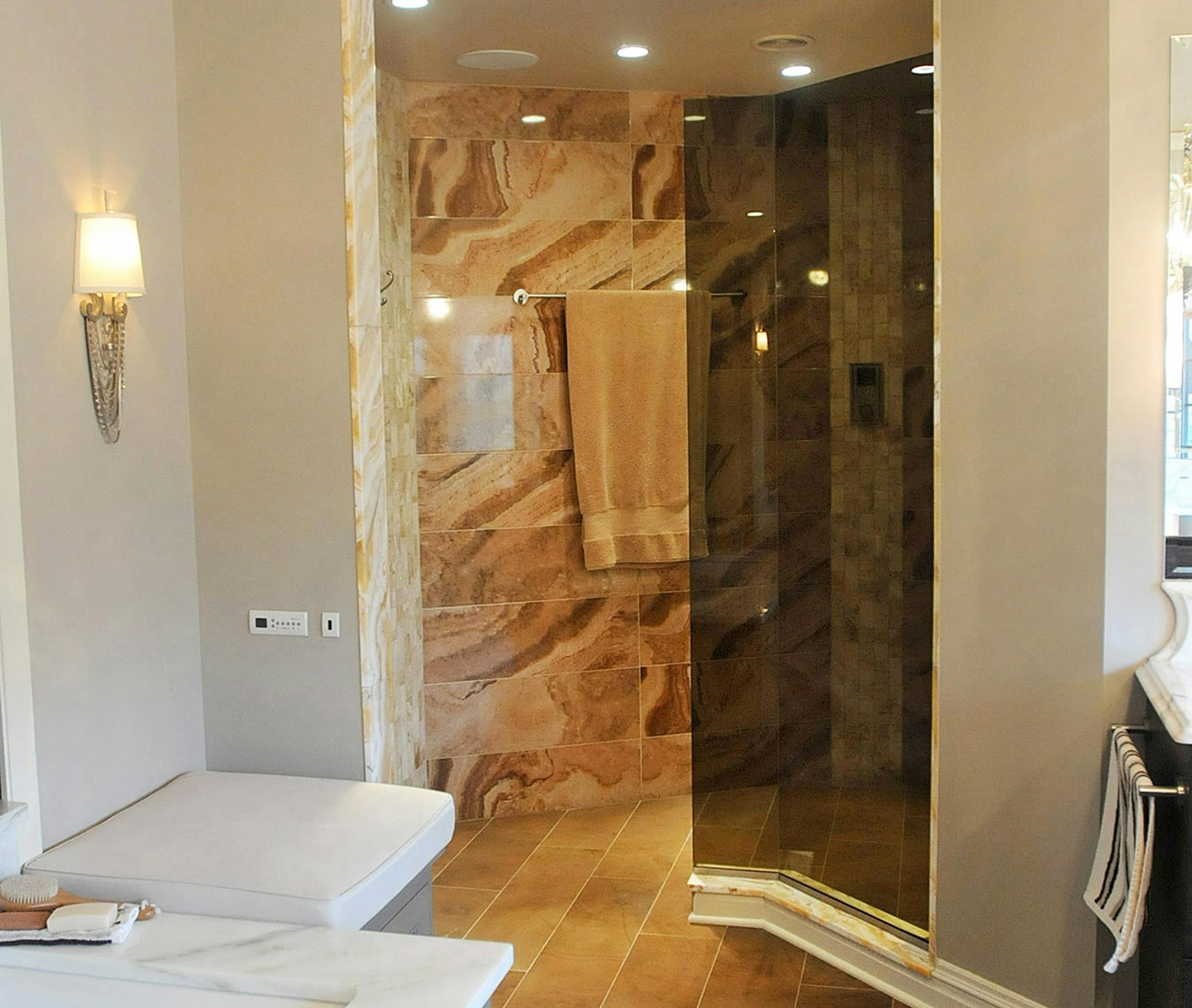 Bathroom remodels that are built to last include features like curbless showers that allow homeowners to age in place.