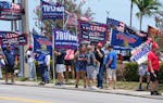 Supporters of former President Donald Trump gather along Southern Boulevard in West Palm Beach, Fla., June 2.