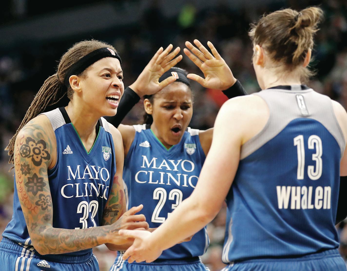 Minnesota Lynx guard Seimone Augustus (33), from left, and Minnesota Lynx forward Maya Moore (23) celebrate a foul on Minnesota Lynx guard Lindsay Whalen (13) during the second half. ] (Leila Navidi/Star Tribune) leila.navidi@startribune.com BACKGROUND INFORMATION: The Minnesota Lynx play the Seattle Storm at Target Center in Minneapolis on Sunday, August 28, 2016. The Minnesota Lynx beat Seattle Storm 92-80.