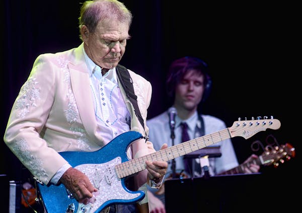 Glen Campbell performs with members of his family at the IP Casino in Biloxi, Miss., in 2011.