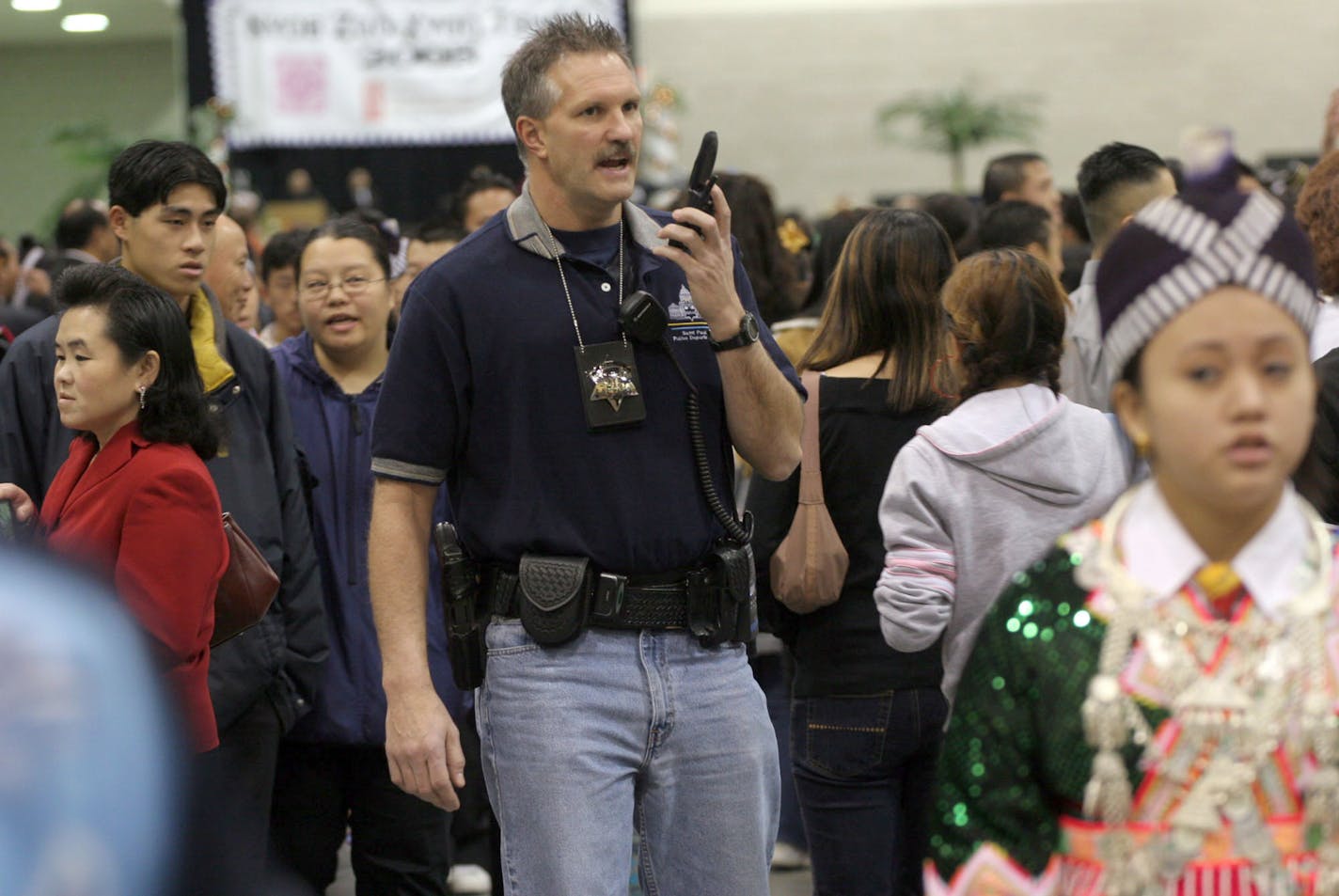 Becoming well-known in the Hmong community is one way law enforcement officials can help encourage rape victims to step forward. In this file photo, St. Paul police Sgt. Richard Straka is pictured at a Hmong New Year's festival.