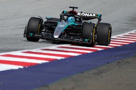 Mercedes driver George Russell of Britain steers his car during the Austrian Formula One Grand Prix race at the Red Bull Ring racetrack in Spielberg, 