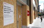 A person walks by a closed CVS store on June 11, 2020 in San Francisco, California. Economic worries due to the coronavirus COVID-19 pandemic continue