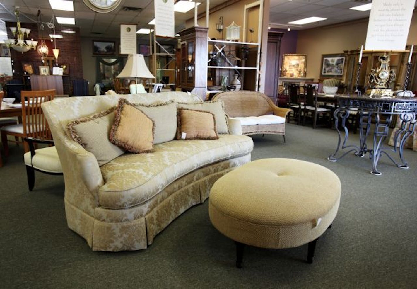 A Century sofa ($1,259) and Hickory Chair ottoman ($195; sold) at Wabi Sabi Shop in Plymouth.