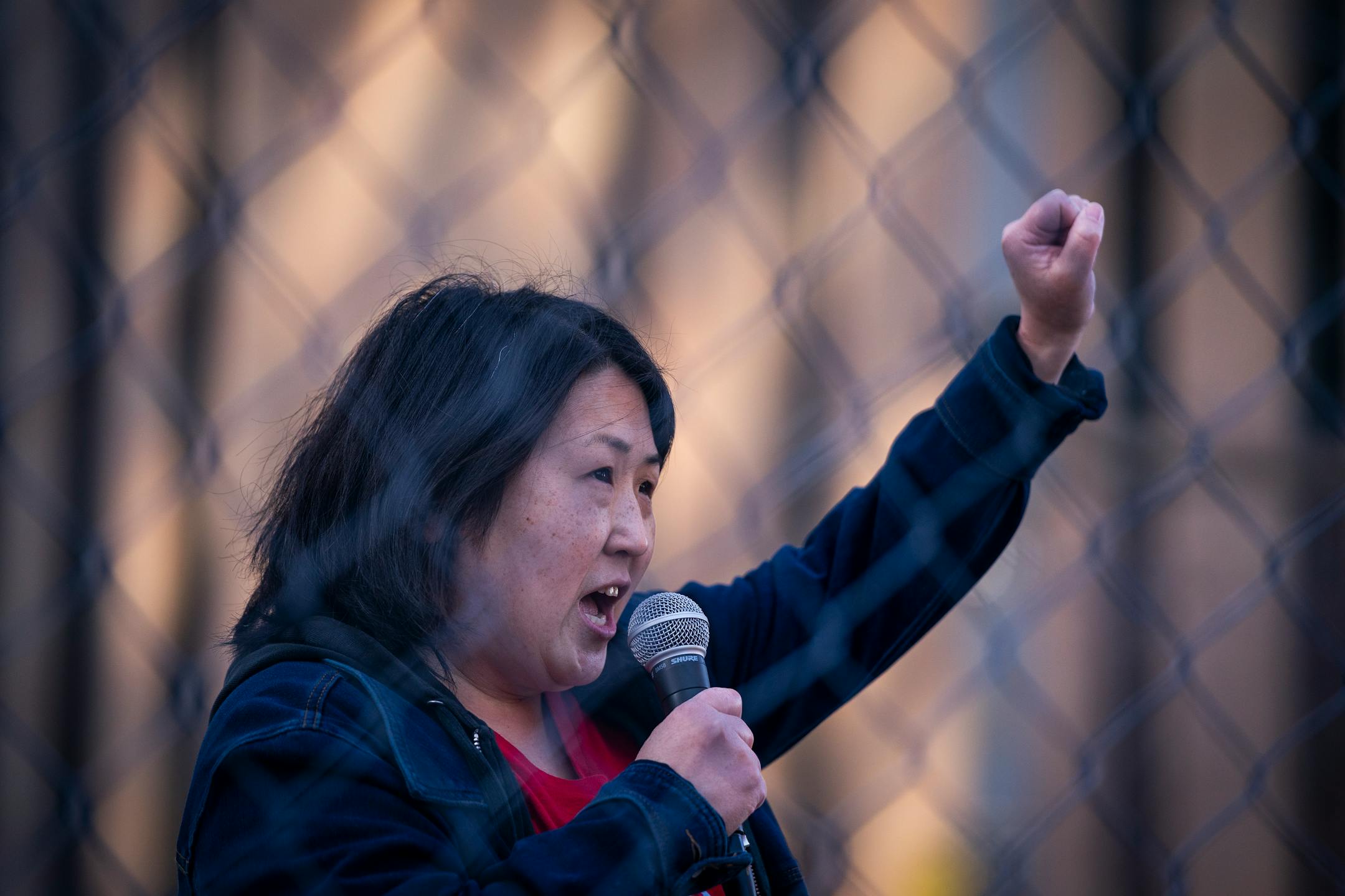 Kaia Hirt, an organizer of the event with the group Good Trouble for Justice spoke during the Locks for Loved Ones Lost: Part II event outside the Hennepin County Government Center.