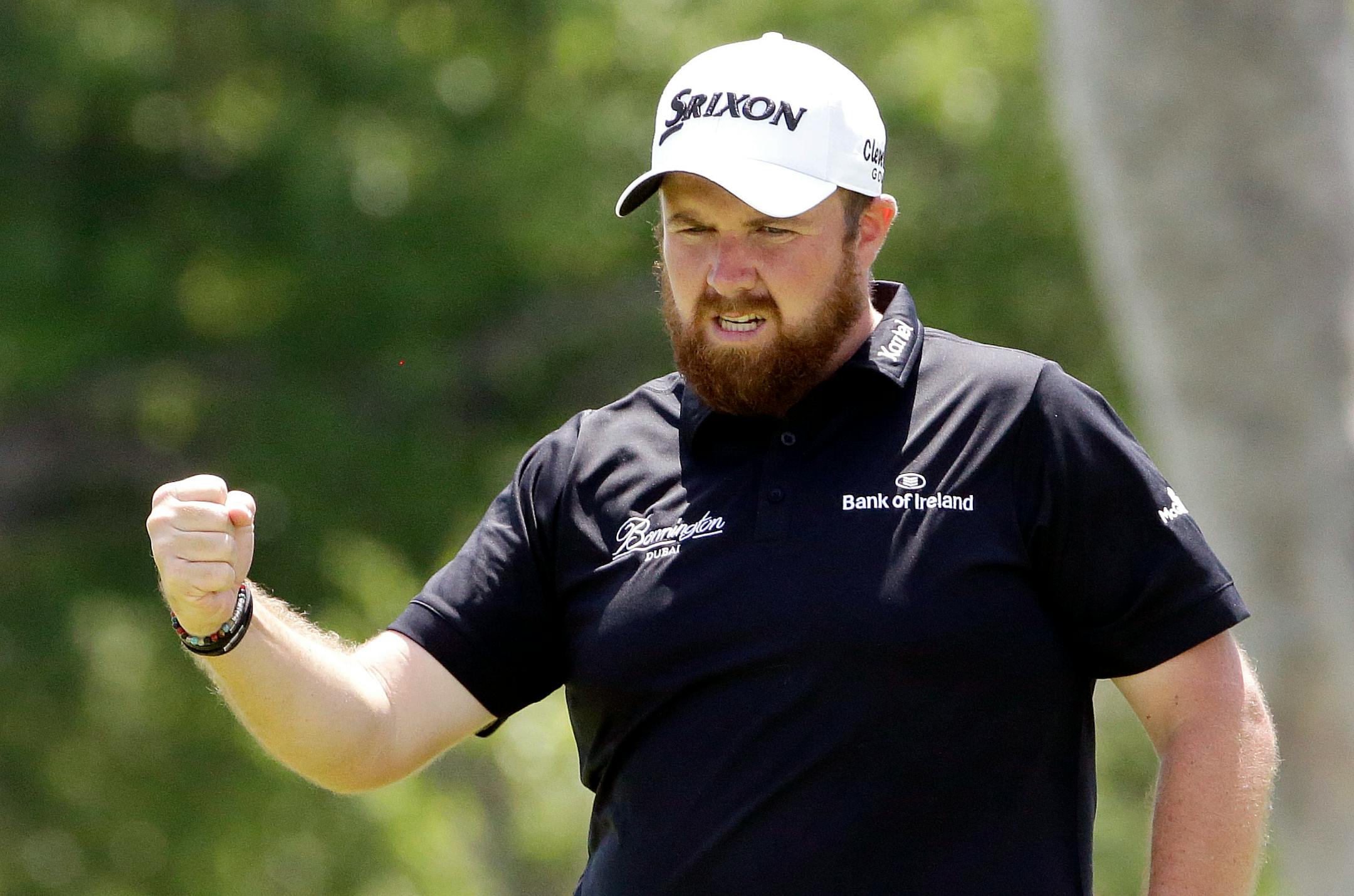 Shane Lowry, of Republic of Ireland, reacts after making a birdie on the ninth hole during the rain delayed second round of the U.S. Open golf championship at Oakmont Country Club on Saturday, June 18, 2016, in Oakmont, Pa. (AP Photo/Gene J. Puskar)