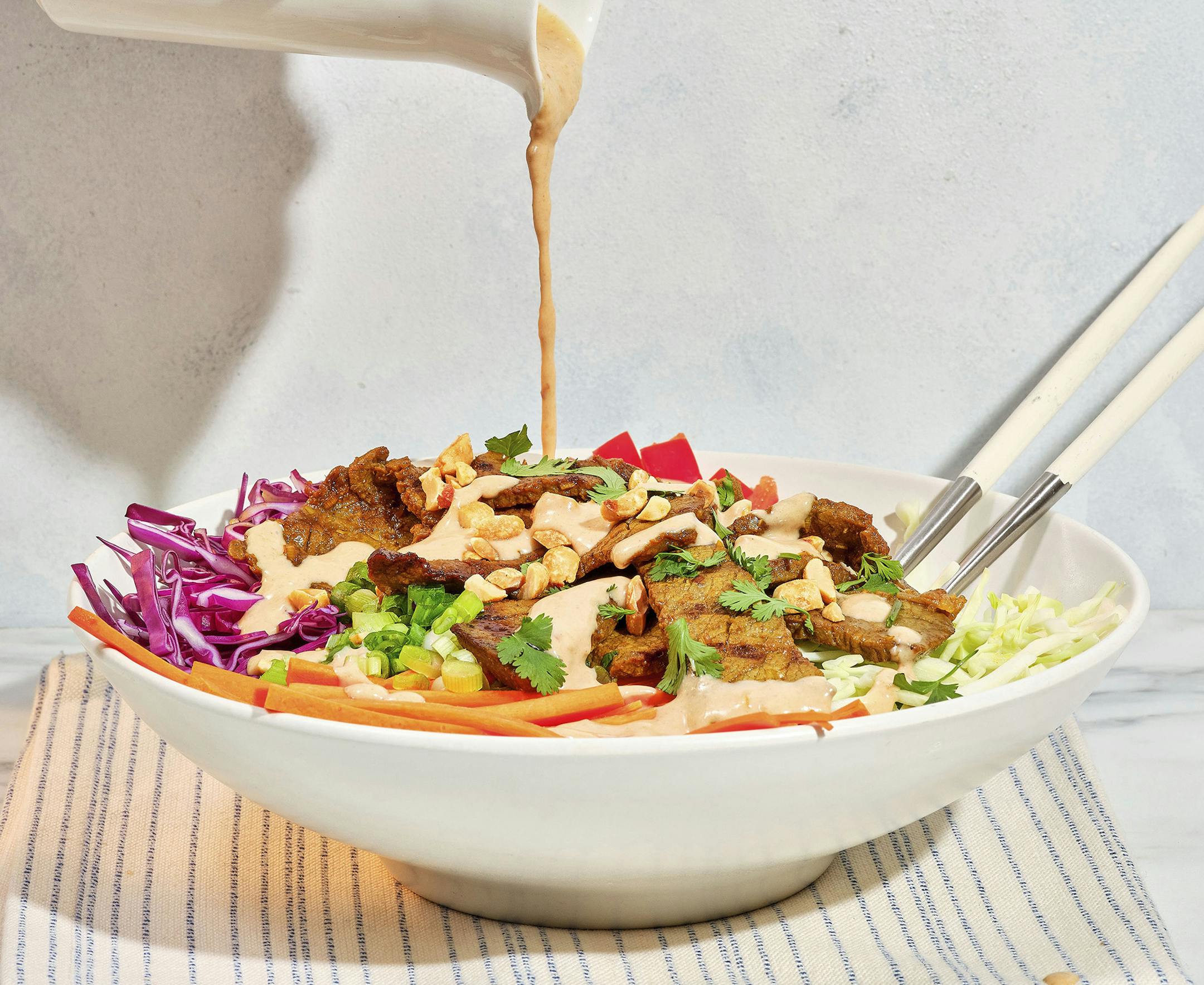 Chopped Beef Salad with Spicy Peanut Sauce from "Beef It Up" by Jessica Formicola (Storey Publishing, 2022). Dominic Perri Photography