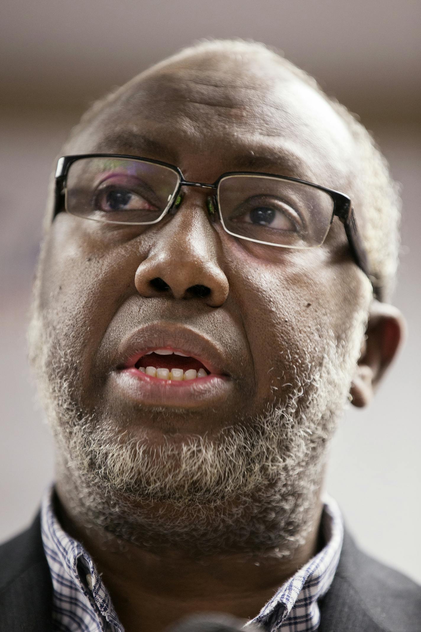 Imam Hassan Mohamud of the Minnesota Da'Wah Institute, along with members of the local Muslim and Somali community, raises concerns about the Department of Justice's new pilot program to counter violent extremism during a press conference on Tuesday, February 17, 2015. ] LEILA NAVIDI leila.navidi@startribune.com /