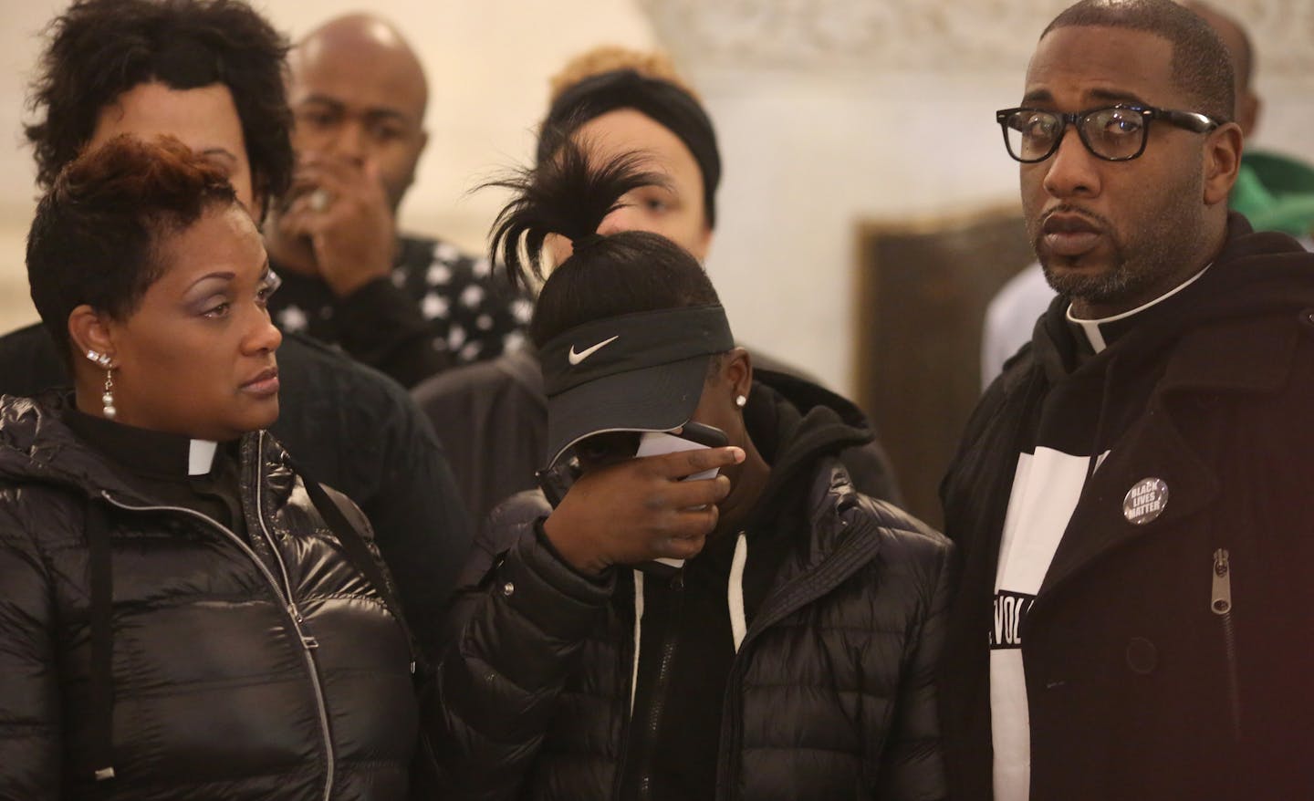 With her mother, Marea Perry co pastor Above Every Name Ministry, on the left and co pastor Danny Givens on the right Isabella Brown, 14, wiped the tears from her eyes during press conference about how she was restrained by MOA security and Bloomington Police. ] (KYNDELL HARKNESS/STAR TRIBUNE) kyndell.harkness@startribune.com Minneapolis NAACP along with Black Lives Matter and black clergy held a press conference demanding an apology from Mall of America and reiterating their call for a boycott