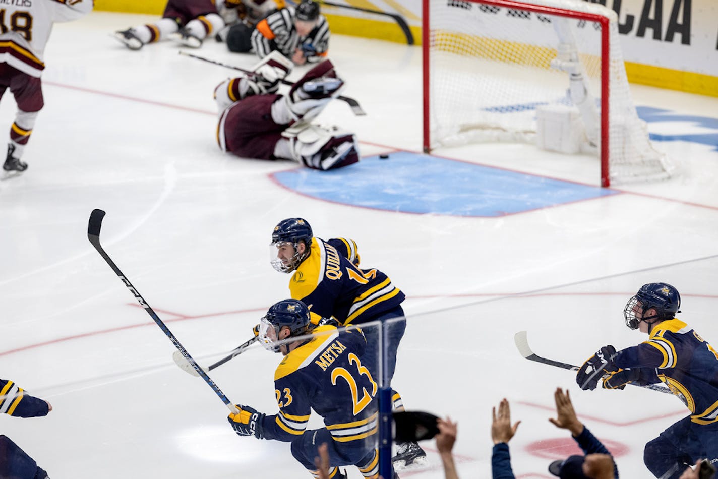 Jacob Quillan (16) of Quinnipiac celebrates after scoring the game winner past Minnesota goalie Justen Close (1) in overtime period Saturday, April 8, 2023, at Amalie Arena in Tampa, Fla. Minnesota Golden Gophers vs. Quinnipiac Bobcats in the finals of the NCAA Frozen Four. ] CARLOS GONZALEZ • carlos.gonzalez@startribune.com.