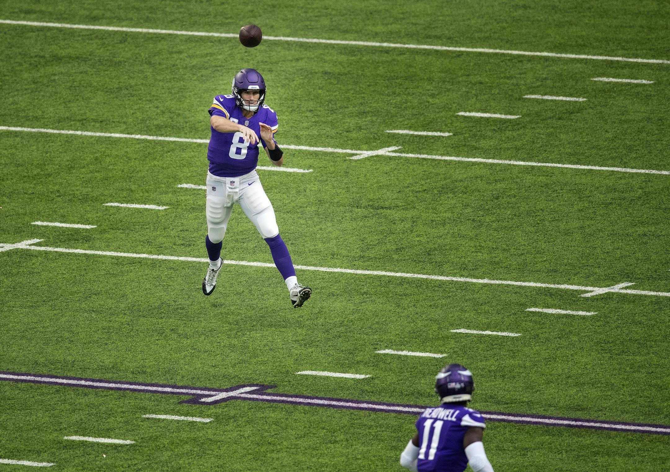 Minnesota Vikings quarterback Kirk Cousins passed the ball to Laquon Treadwell in the first quarter.