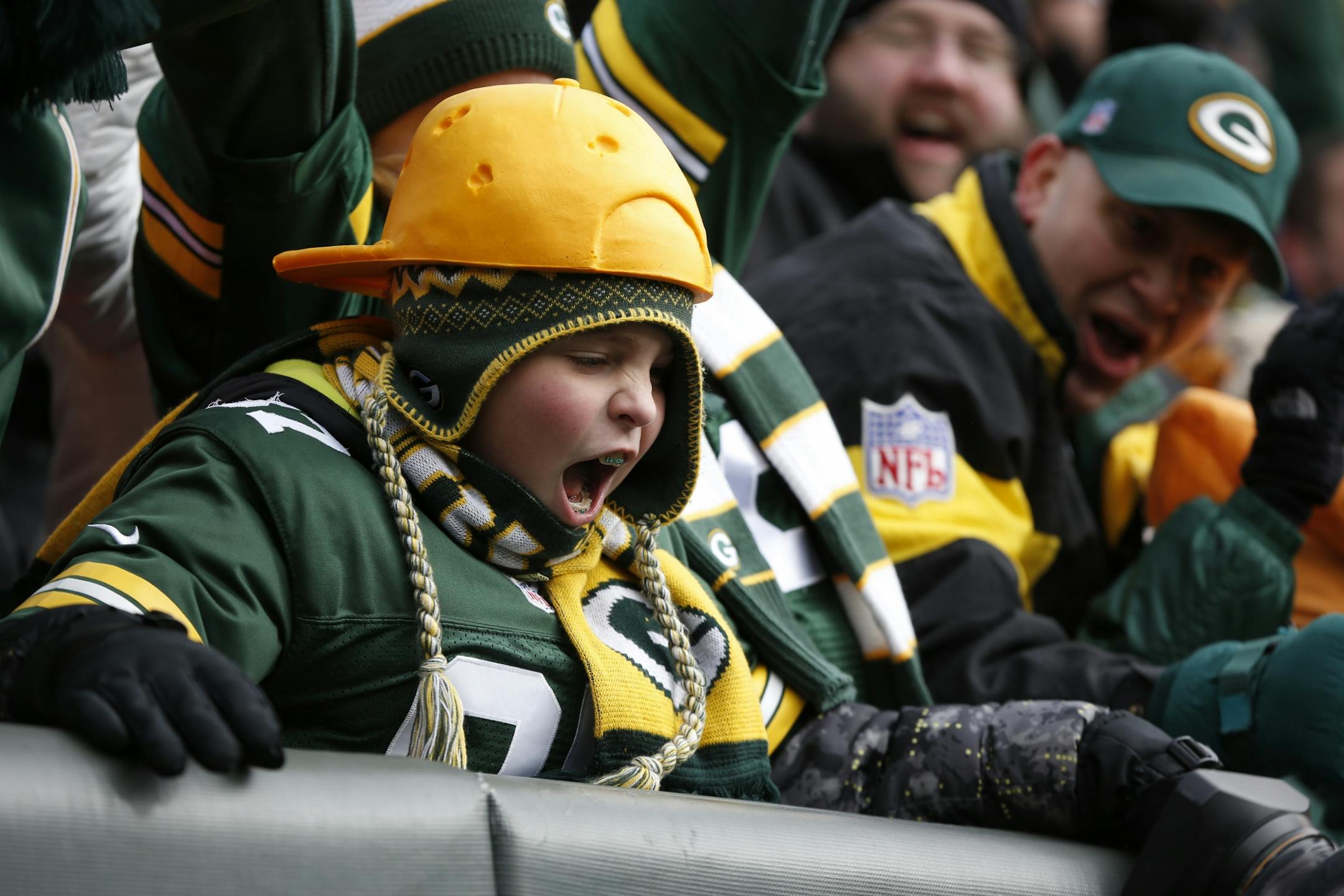 Packers fan Ryan Duffy, from New Jersey, celebrated after quarter Scott Tolzien ran for the first touchdown of the game.
