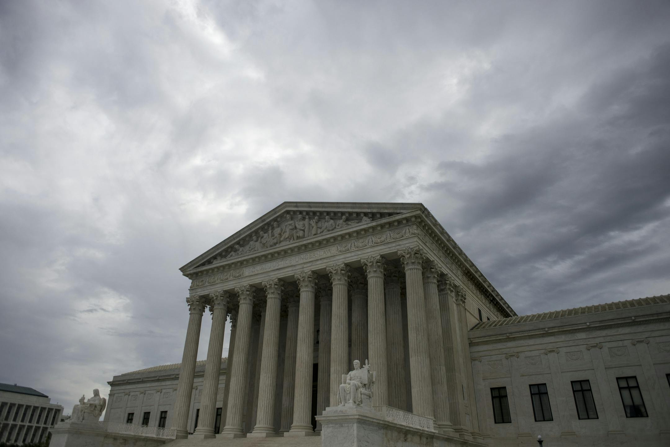 FILE-- The U.S. Supreme Court building in Washington, April 17, 2017. The court announced on June 19, that it would consider whether partisan gerrymandering violates the Constitution. The case could reshape American politics. In the past, the court has struck down election maps as racial gerrymanders that disadvantaged minority voters. But it has never disallowed a map on the ground that it was drawn to give an unfair advantage to a political party. (Gabriella Demczuk for The New York Times)