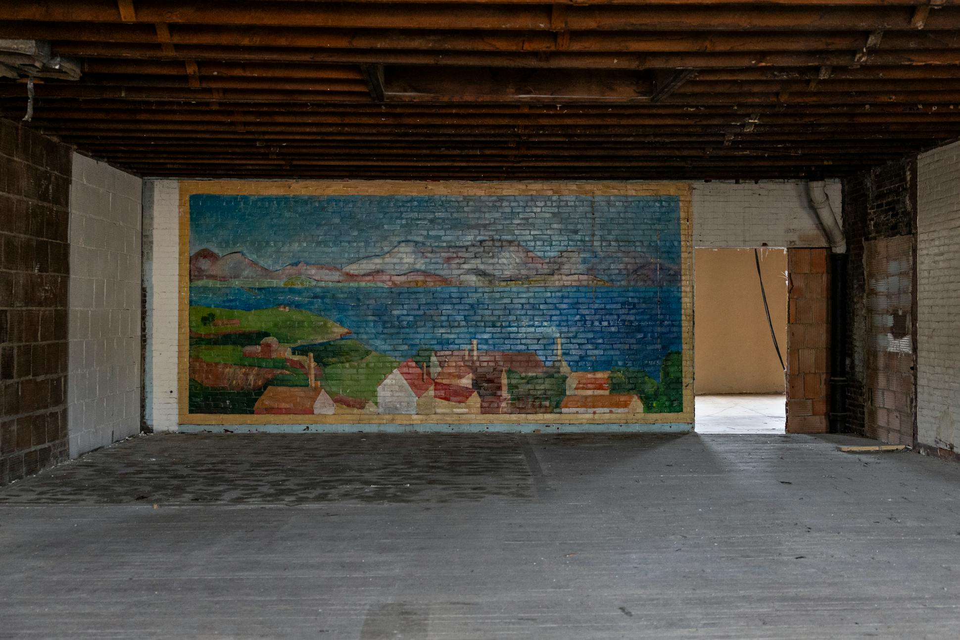 A mural sits preserved inside Plaza del Sol as the two-story building undergoes construction to become a hub for Latino-owned businesses in St. Paul on Wednesday, June 19. The project is projected to finish next spring and is expected to bring more people and businesses to the area.