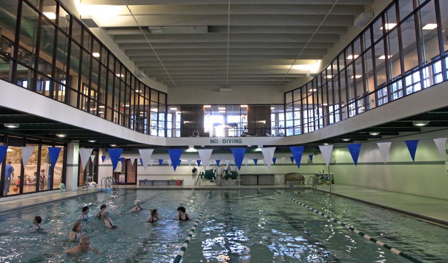 Seniors took part in the morning stretching and toning class at the Edinborough Park pool, as children and parents played in the play area next to the pool on 2/9/12. Seniors who live near Edinborough Park in Edina are pelting the City Council with letters protesting the possible elimination of the park's lap pool. Last month, a consultant suggested the city close the pool to update the facility. That's hasn't gone over well with seniors who live in the Edinborough condo building or in nearby ap