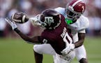 Alabama cornerback Terrion Arnold knocks down a pass intended for Texas A&M wide receiver Ainias Smith last October. Arnold is expected to be one of t