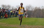Senior Khalid Hussein from Wayzata won the Class 2A boys' cross-country title Saturday at St. Olaf College in Northfield.