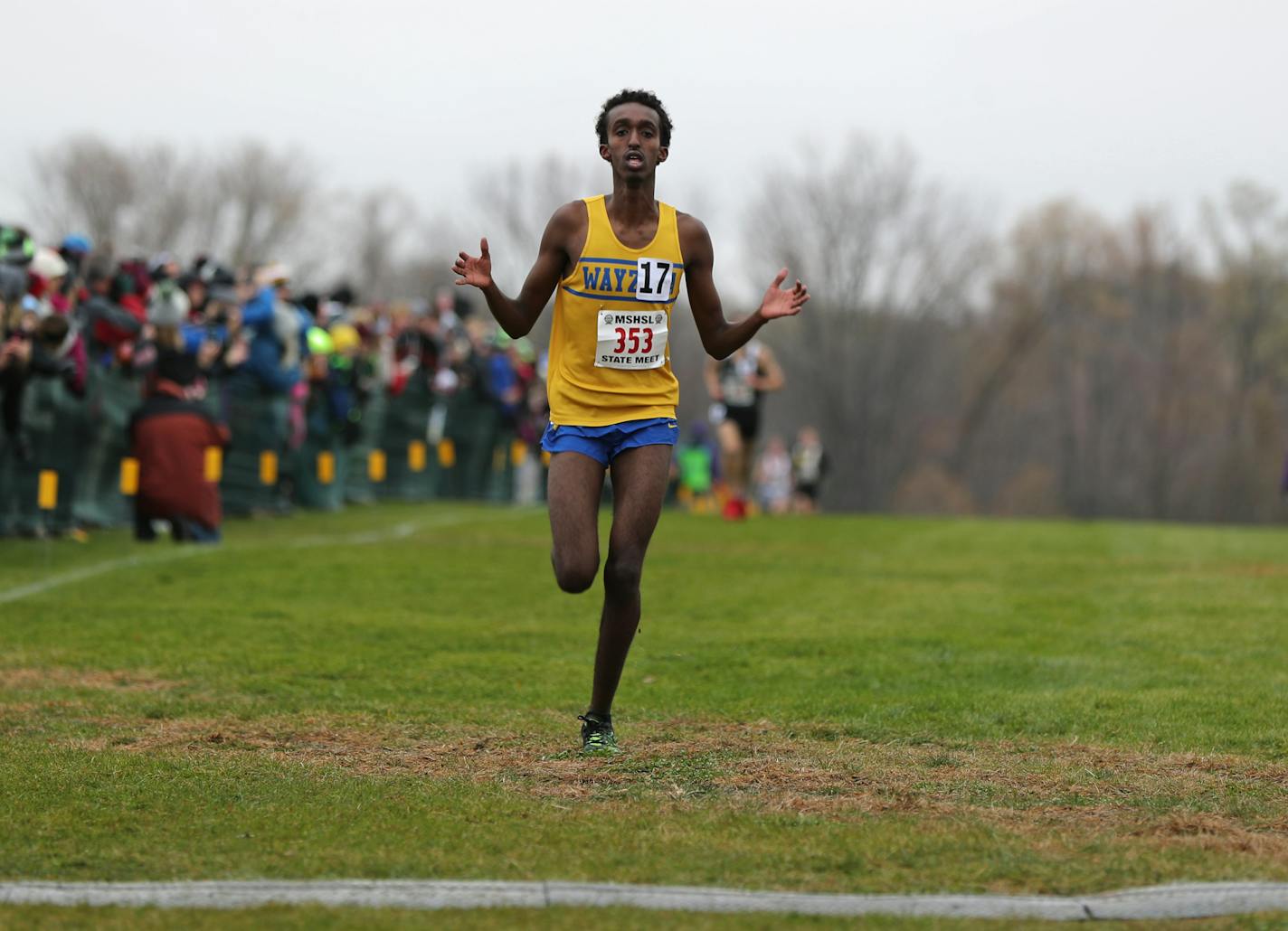 Senior Khalid Hussein from Wayzata won the Class 2A boys' cross-country title Saturday at St. Olaf College in Northfield.