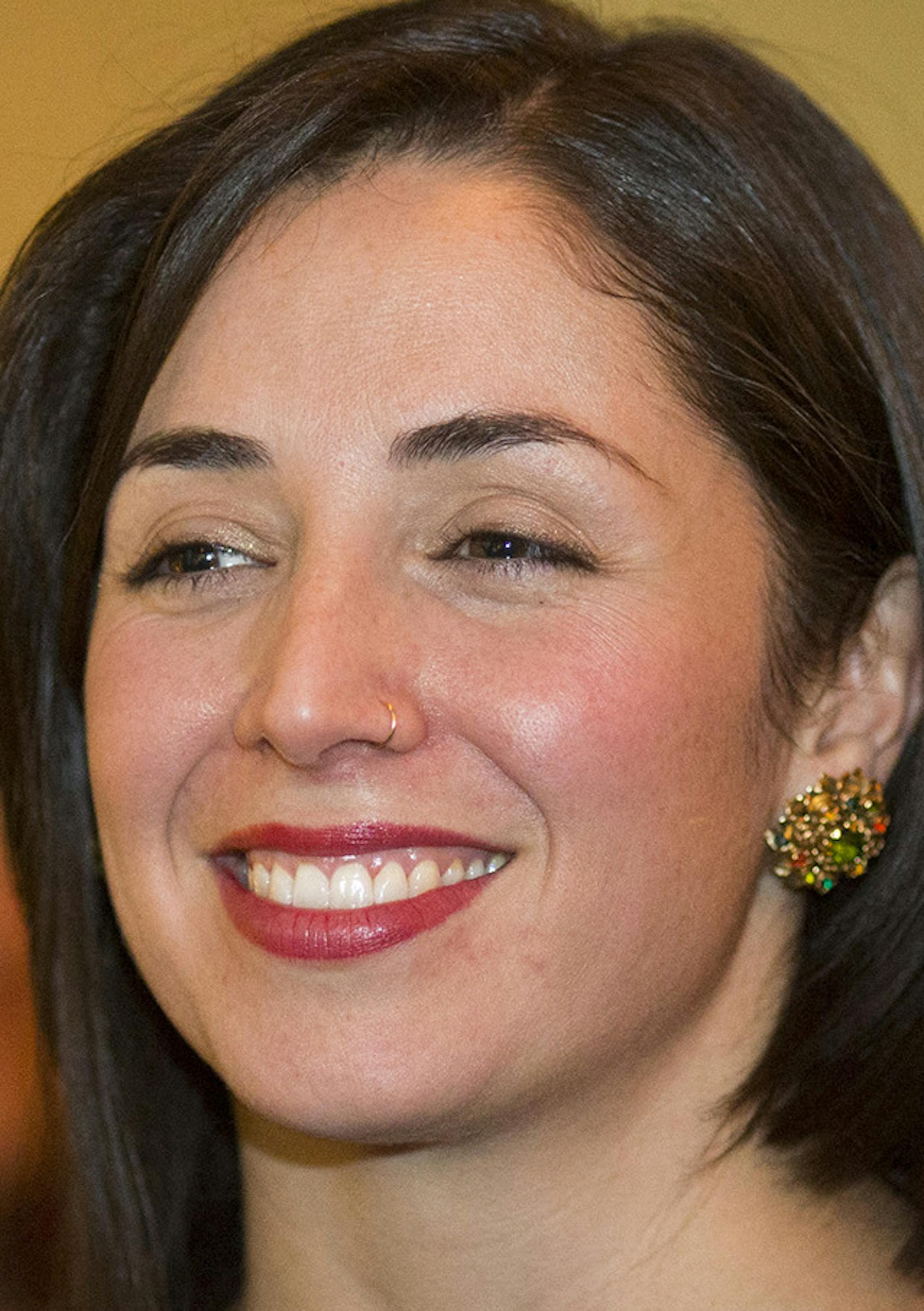 Minneapolis City Council member Alondra Cano listened to a speech at a launch of a new podcast called Latina Theory at Nico's on Wednesday, January 6, 2015, in Minneapolis, Minn. ] RENEE JONES SCHNEIDER • reneejones@startribune.com ORG XMIT: MIN1601062143411391