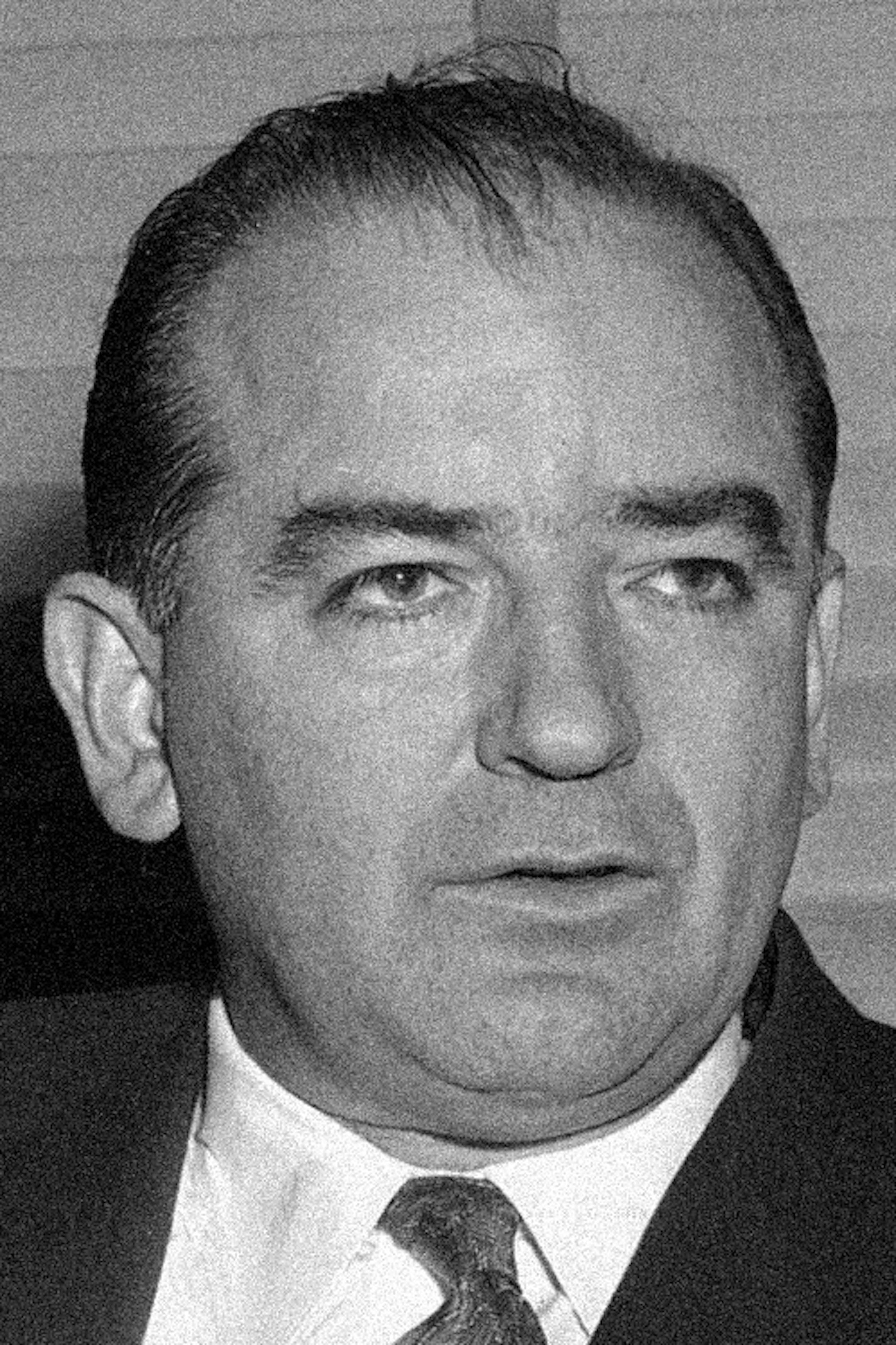 Sen. Joseph McCarthy (R-Wis.) tells newsmen on March 26, 1954 that he will not ask for the right to testify at his Senate Investigation Subcommittee public hearings to probe into his row with Army officials. Saying he would leave it up to the committee McCarthy added, "If I were one of the other six (members), I would ask McCarthy to testify." (AP Photo/Bill Allen) ORG XMIT: APHS363834