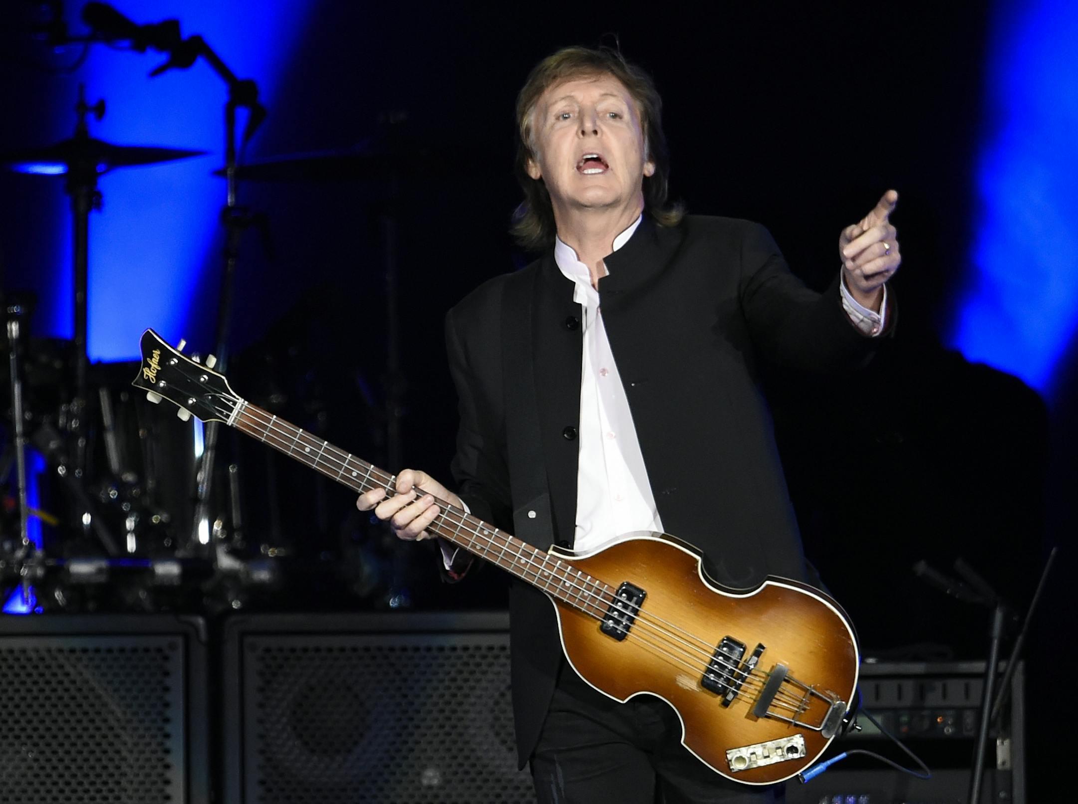 Paul McCartney greets the crowd as he arrives onstage for his performance on day 2 of the 2016 Desert Trip music festival at Empire Polo Field on Saturday, Oct. 8, 2016, in Indio, Calif.