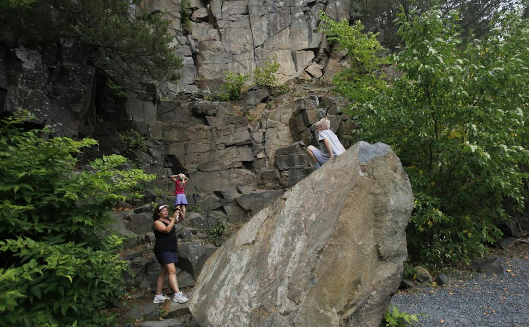 Amy Horne of Andover photographed her son Zane, 8, on a rock while her daughter Ava, 4, checked out the nearby cliff at Interstate State Park inTaylor Falls, MN.