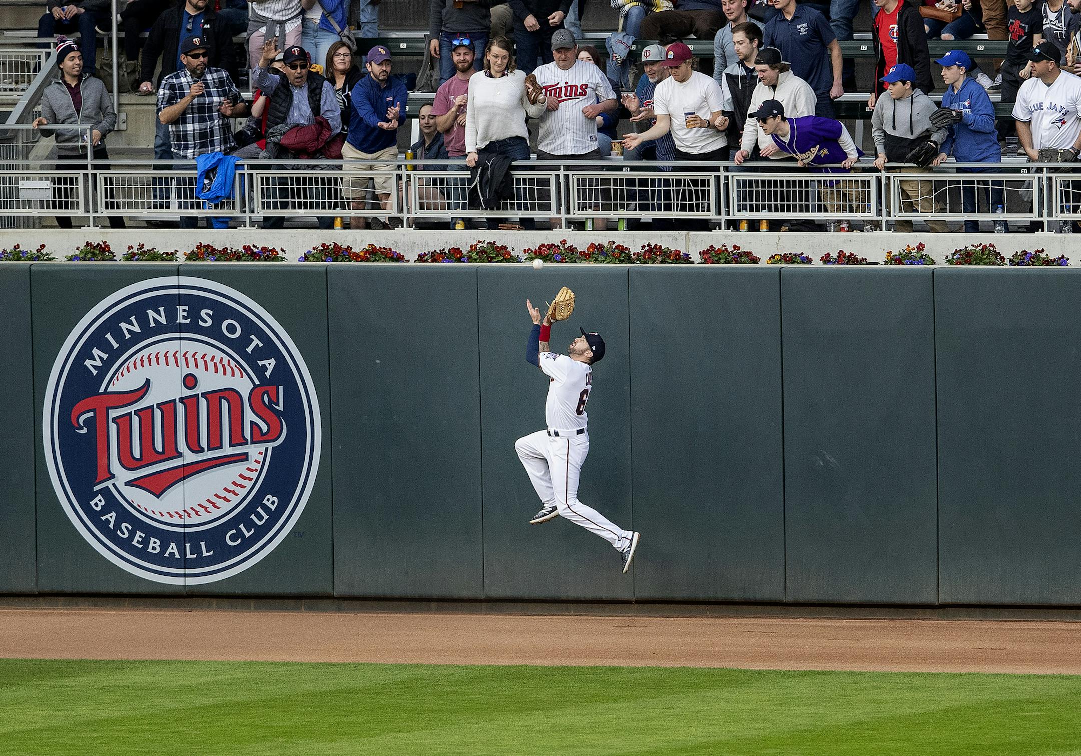 Twins left fielder Jake Cave caught a fly ball by Rowdy Tellez in the second inning. ] CARLOS GONZALEZ &#x2022; cgonzalez@startribune.com &#x2013; Minneapolis, MN &#x2013; April 16, 2019, Target Field, MLB, Minnesota Twins vs. Toronto Blue Jays