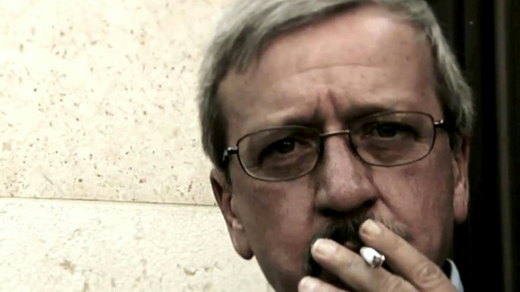 This frame grab from a Herman Cain campaign advertisement shows campaign manager Mark Block smoking a cigarette in an ad. He is the man with the mustache who takes a rebellious drag on a cigarette in the Herman Cain Internet ad gone viral. "We've run a campaign like nobody's ever seen," he says before taking a puff. "But then America's never seen a candidate like Herman Cain." Meet Mark Block, Cain's unorthodox campaign manager. Perhaps no one is more responsible for the Georgia businessman's me