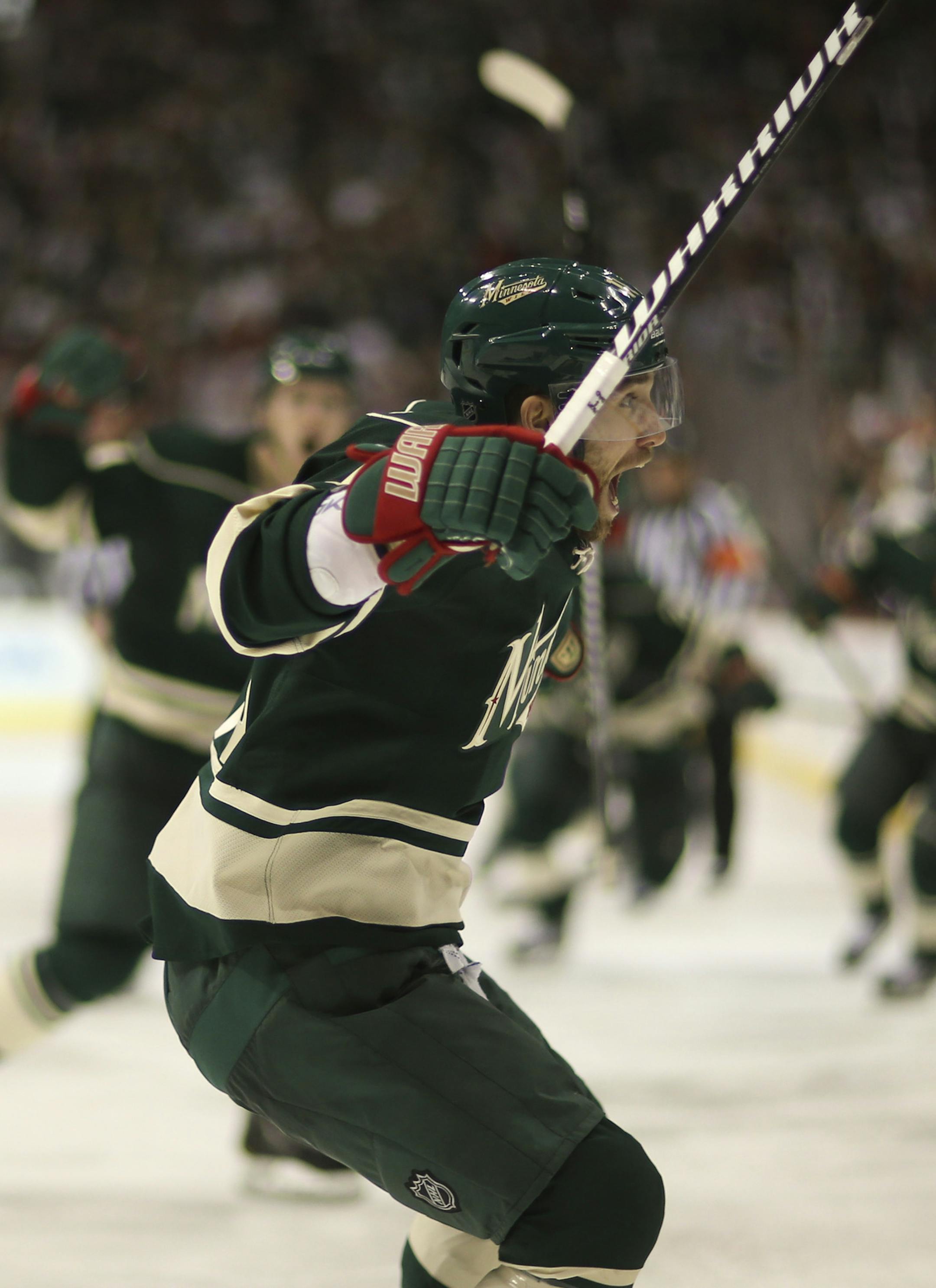 The Minnesota Wild beat the Chicago Black Hawks 3-2 in overtime in game three of their first round playoff series Sunday afternoon, May 25, 2013 at Xcel Energy Center in St. Paul. The Minnesota Wild's Jason Zucker headed for the glass as he celebrated his game winning goal early in the overtime period Sunday afternoon. ] JEFF WHEELER ‚Ä¢ jeff.wheeler@startribune.com