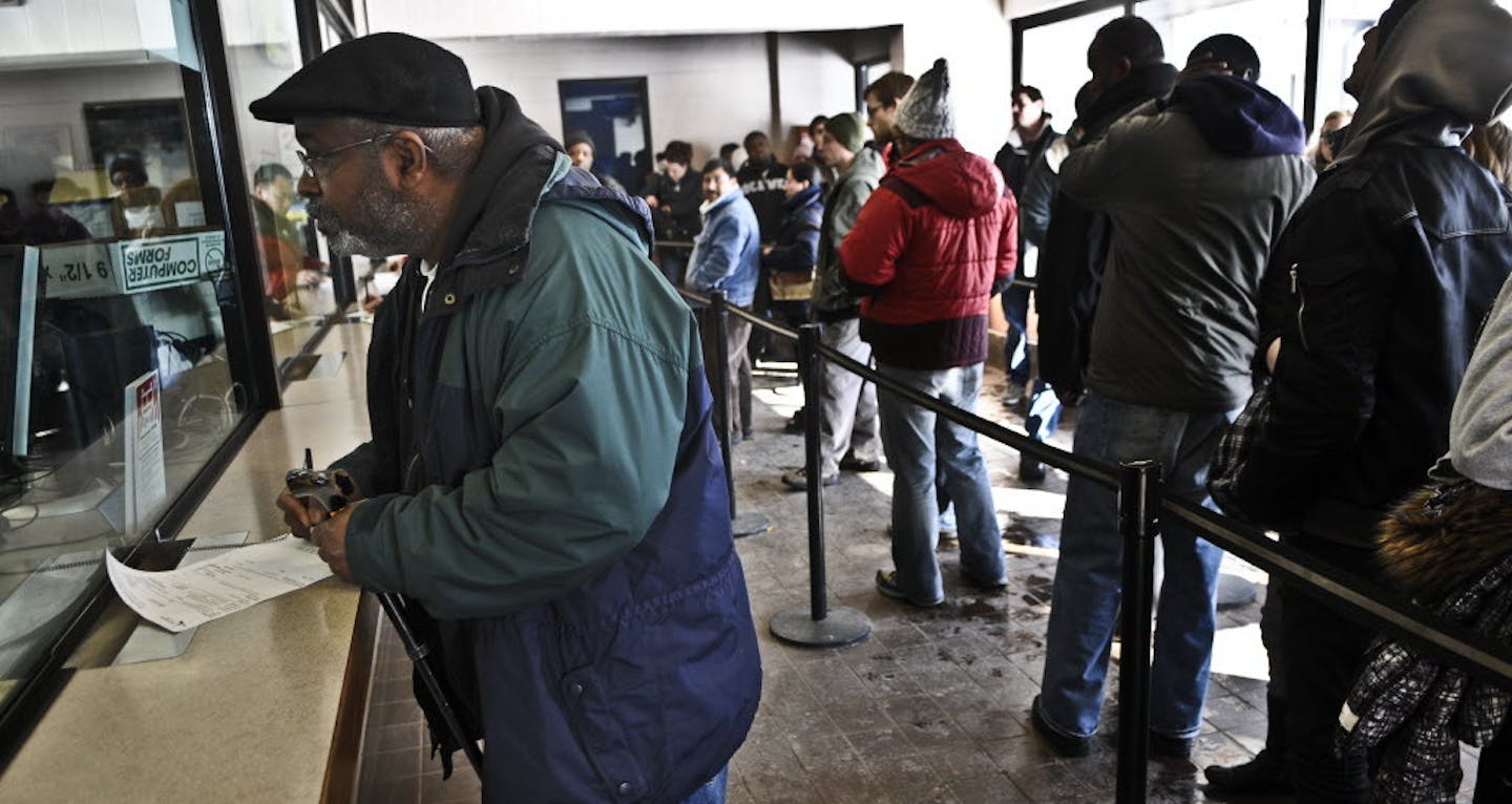 The Minneapolis impound lot filled with people retrieving their cars after a 2011 snowfall.