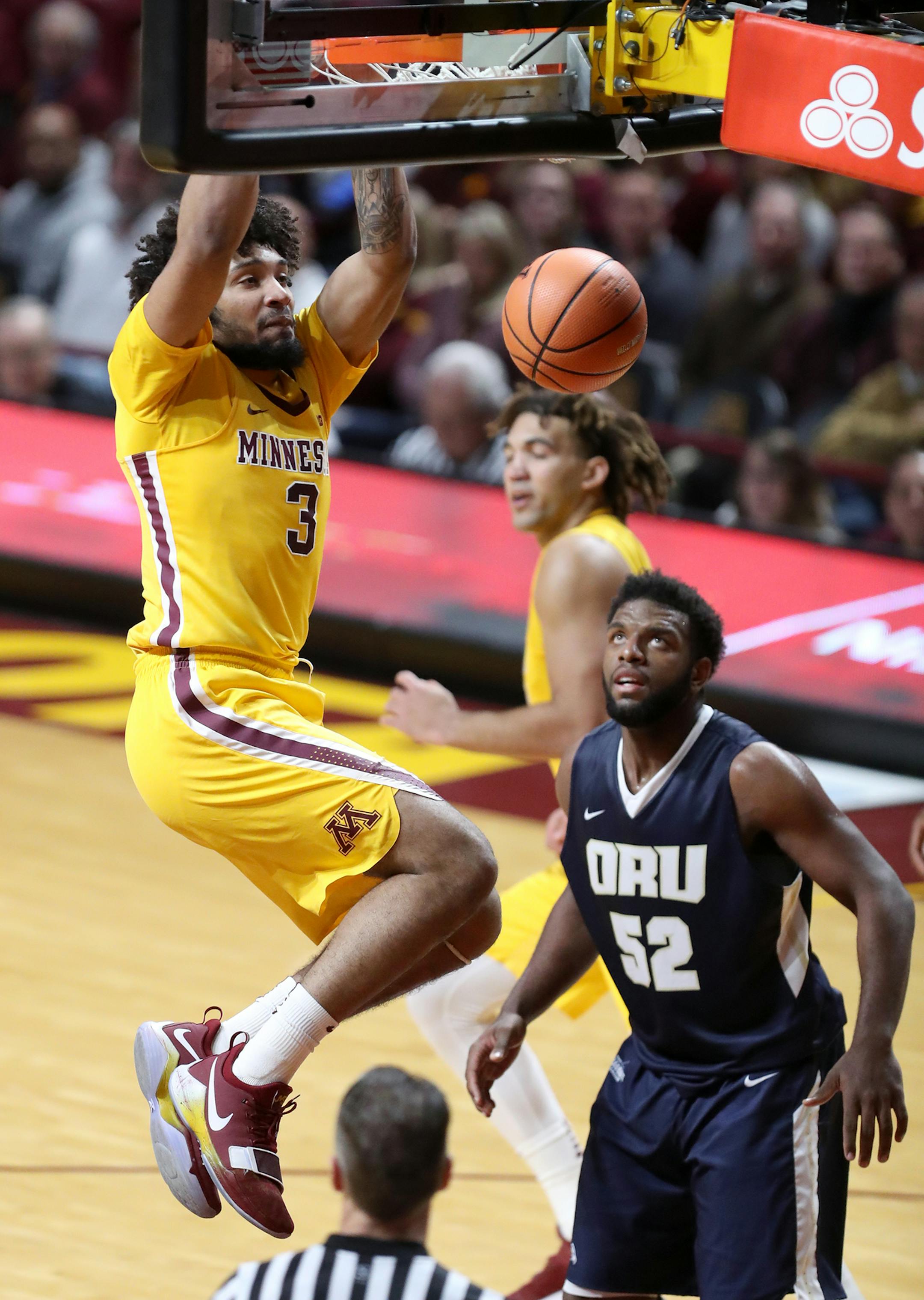 Jordan Murphy (3) of the Minnesota Golden Gophers dunks the ball during the first half. ] LEILA NAVIDI ï leila.navidi@startribune.com BACKGROUND INFORMATION: Minnesota Golden Gophers play against the Oral Roberts Golden Eagles at Williams Arena in Minneapolis on Thursday, December 21, 2017.