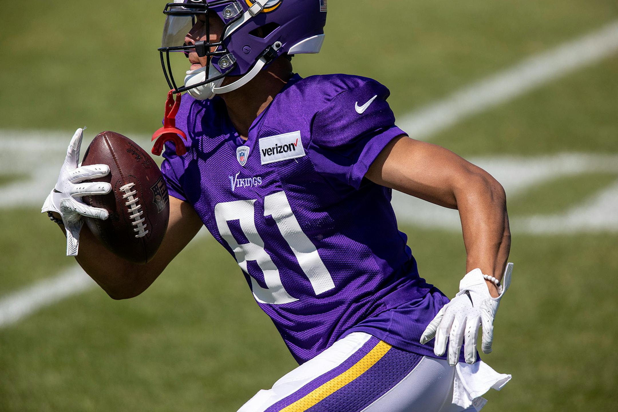 Minnesota Vikings receiver Bisi Johnson (81) ran during practice.