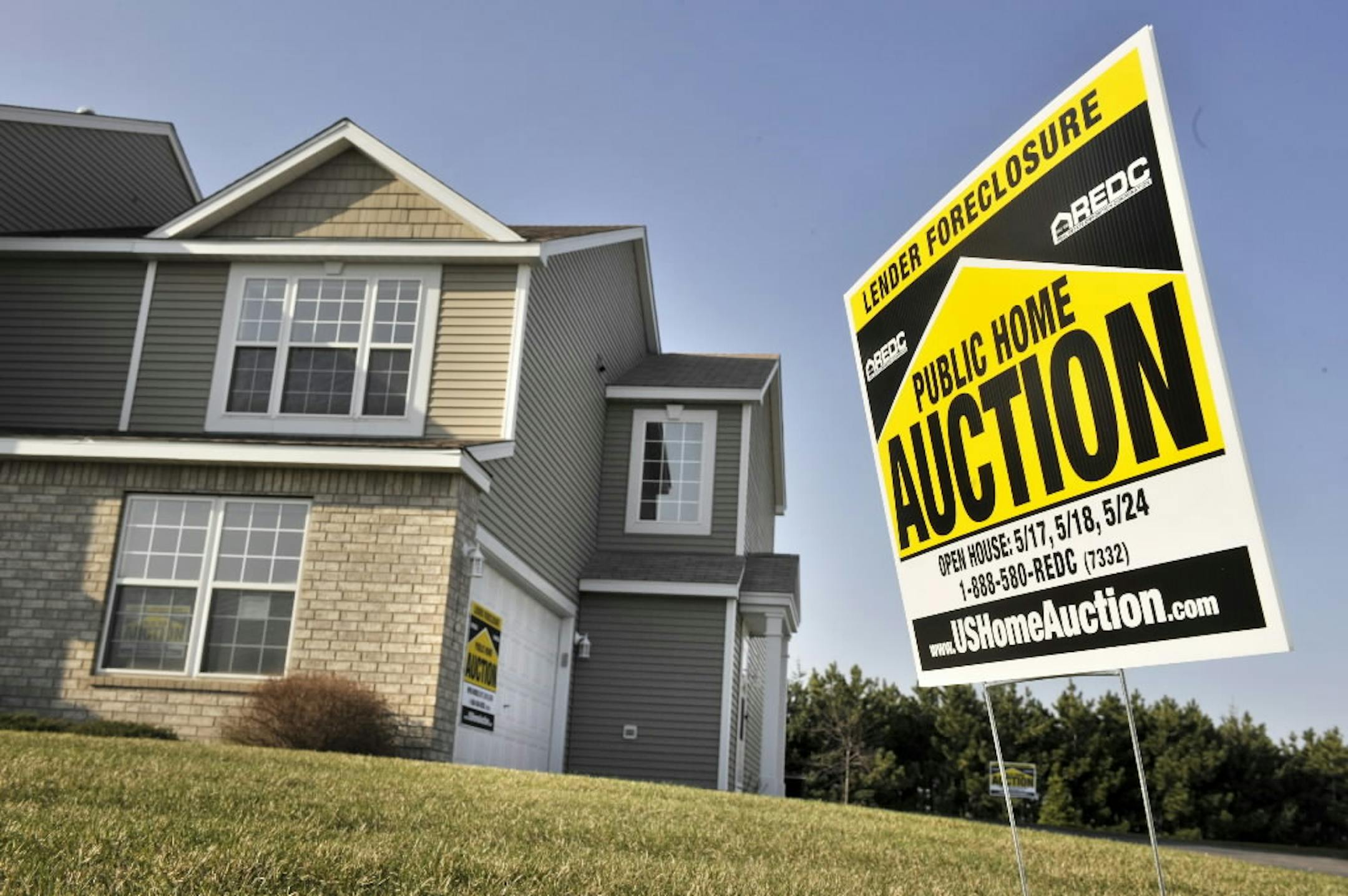 A foreclosed Apple Valley twin home offered for auction last April.