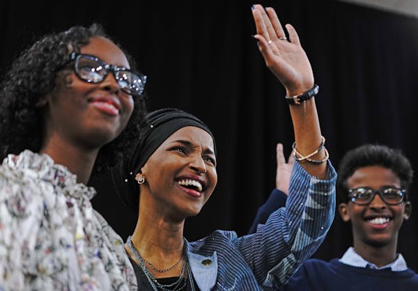 Ilhan Omar, flanked by family, delivers her victory speech. ] MARK VANCLEAVE ï mark.vancleave@startribune.com * Ilhan Omar is poised to become the fi