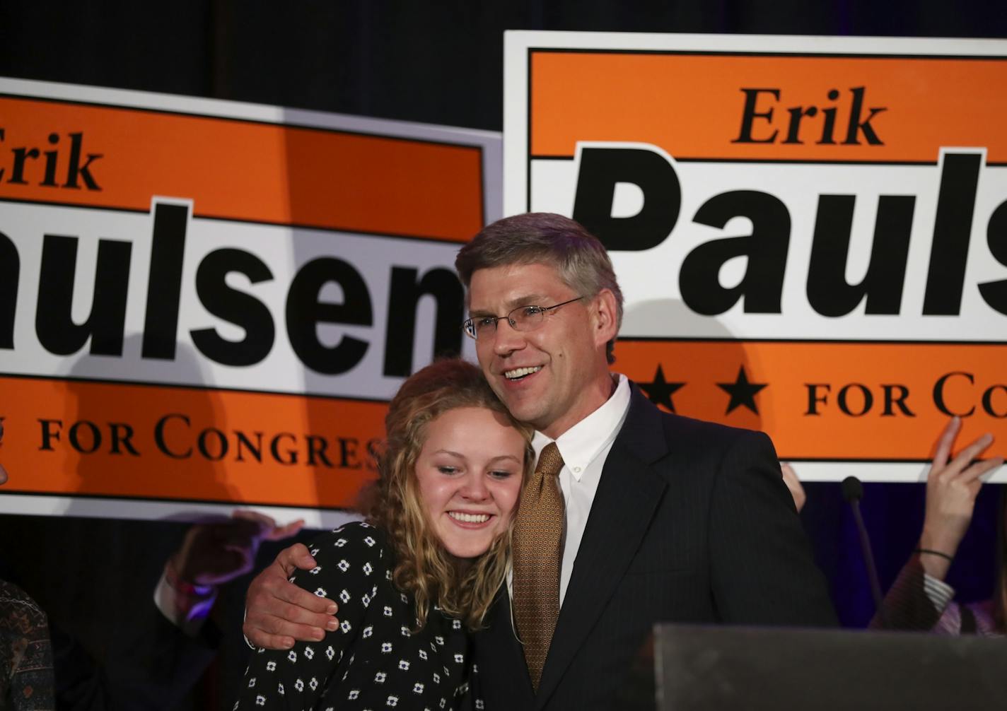 Erik Paulsen hugged one of his daughters after he addressed the Republican victory party crowd.