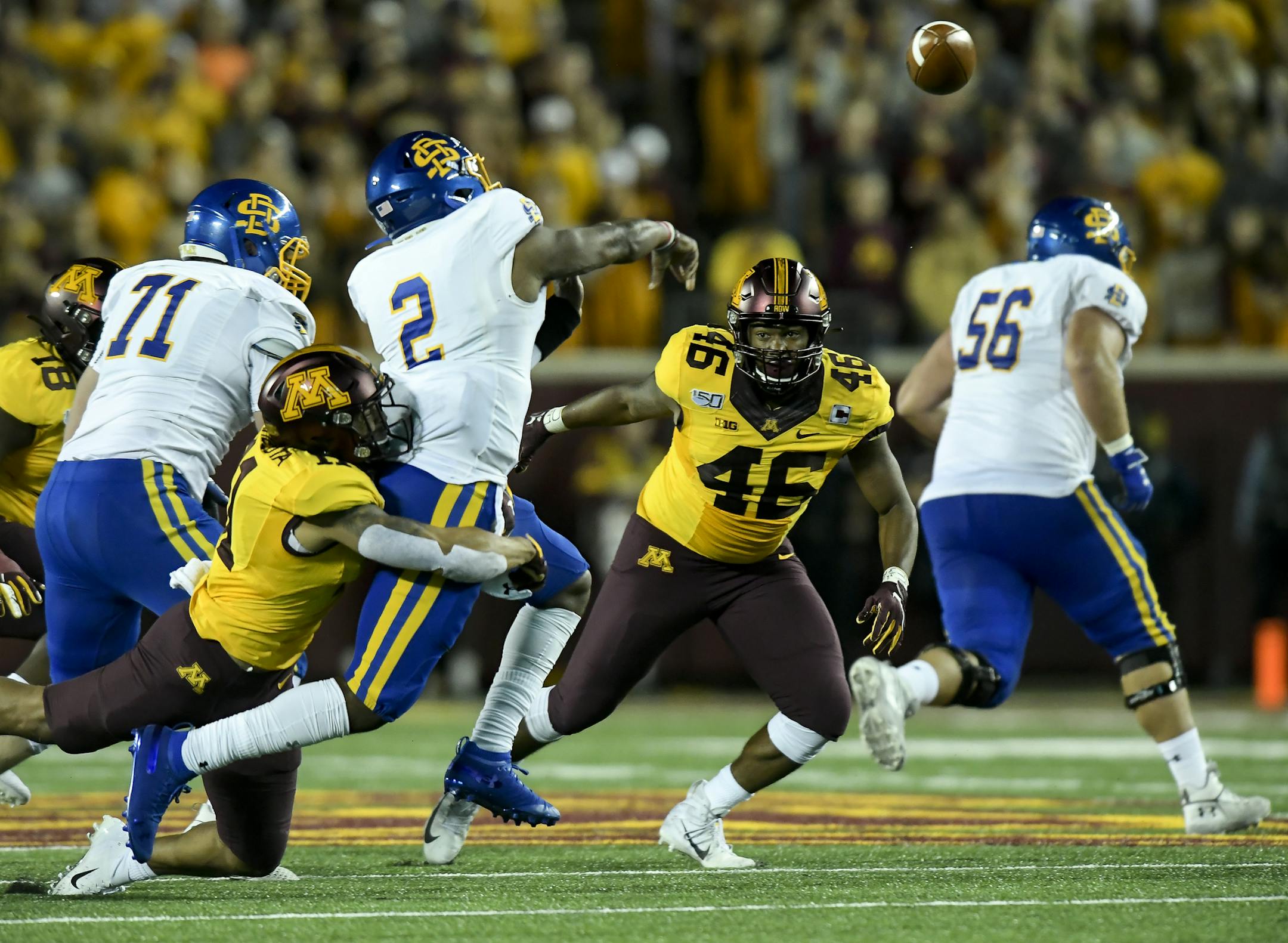 Minnesota Gophers defensive back Antoine Winfield Jr. (11) tackled South Dakota State Jackrabbits quarterback J'Bore Gibbs (2) during the third quarter of the opener against South Dakota State.