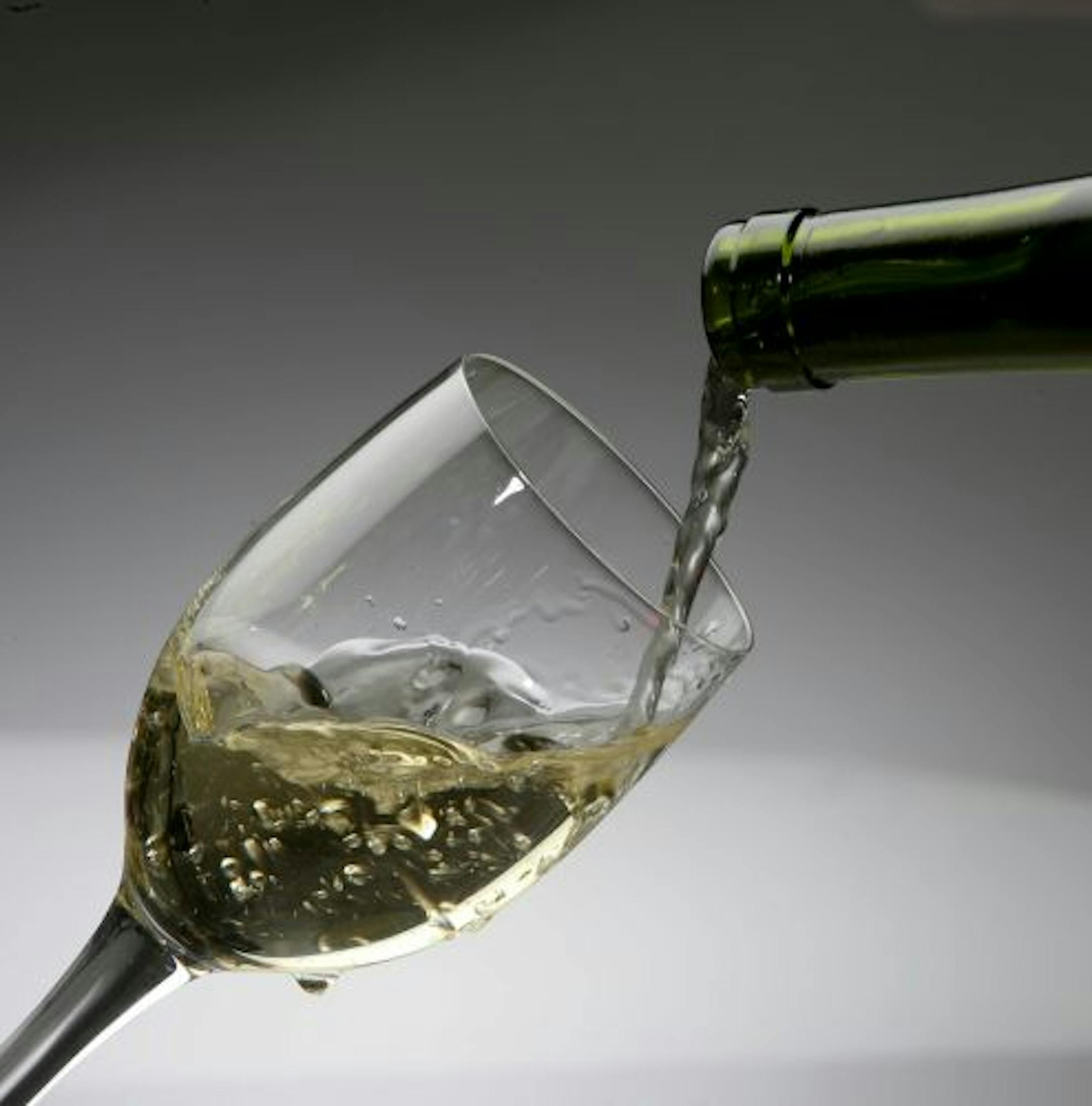 Muscadet wine is poured at a tasting in New York, Aug. 4, 2010. The virtues of Muscadet wine extend beyond oysters to many seafood dishes as well as light poultry preparations and pasta dishes.