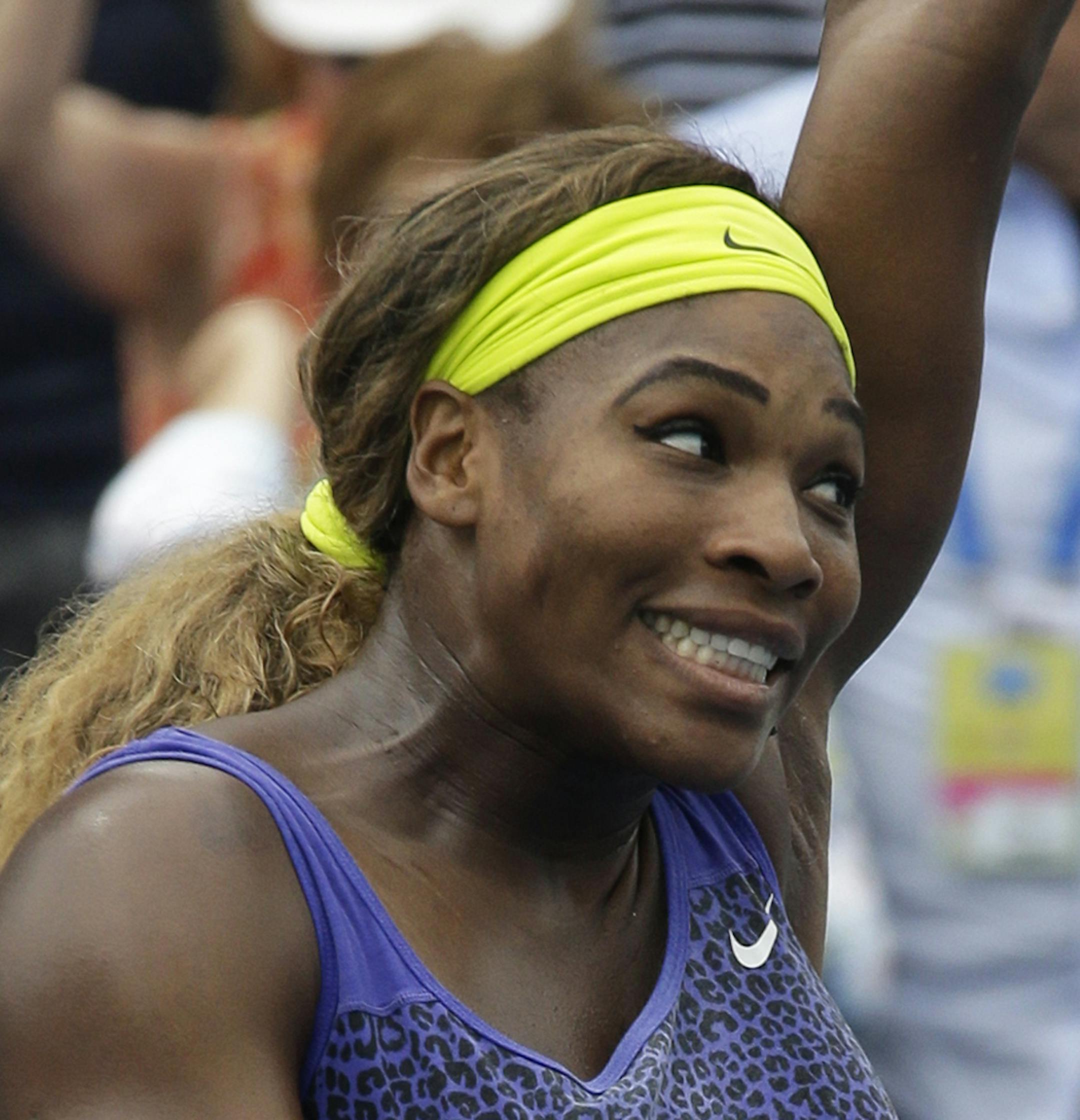 Serena Williams acknowledges the crowd after defeating Ana Ivanovic, from Serbia, 6-4, 6-1, in a final match at the Western & Southern Open tennis tournament, Sunday, Aug. 17, 2014, in Mason, Ohio. (AP Photo/Al Behrman) ORG XMIT: MIN2014082300472996