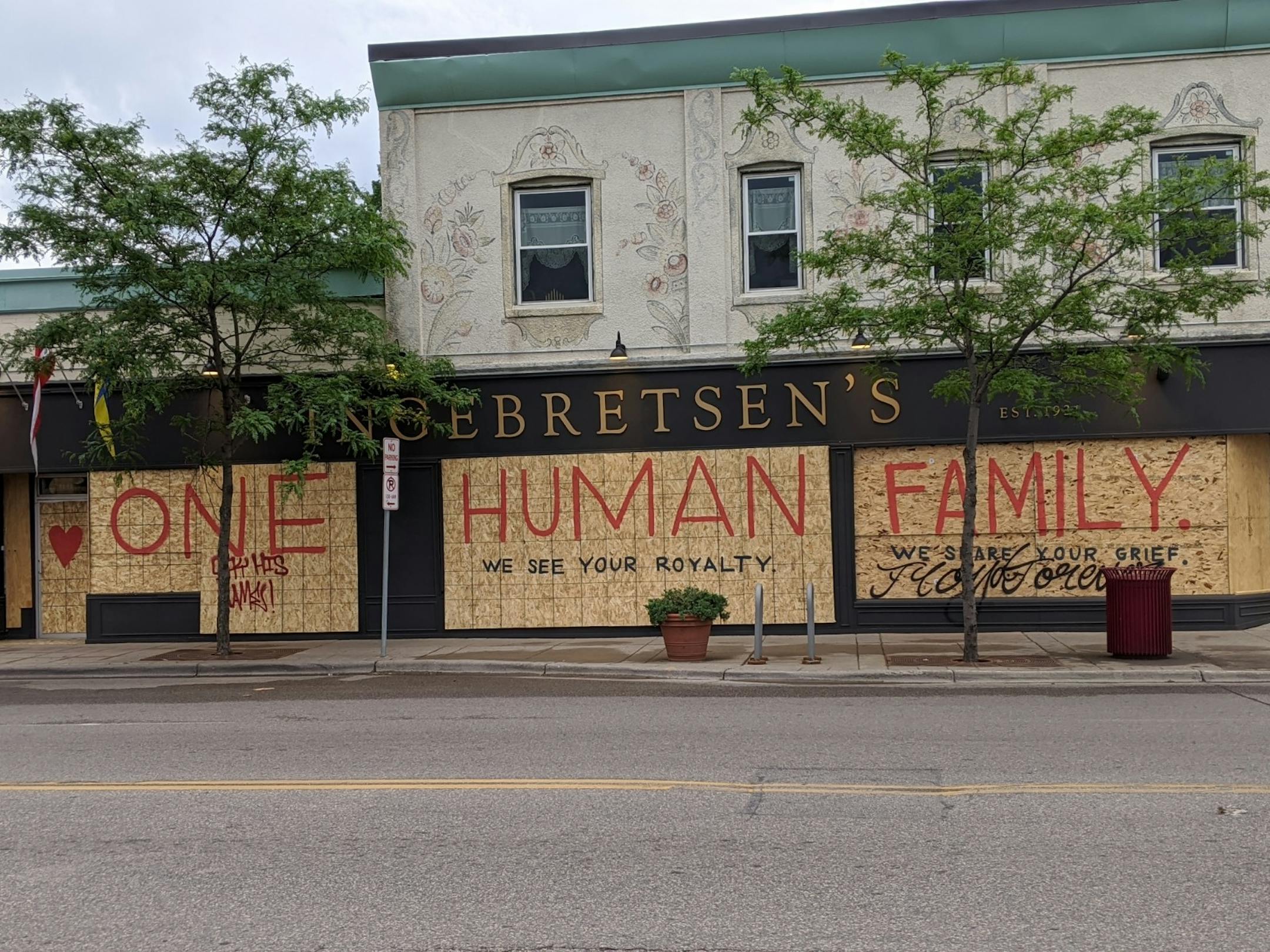 Calls for global solidarity appear on the large mural covering three windows of IngebretsenÕs Scandinavian Gifts & Foods at 1601 E Lake St.