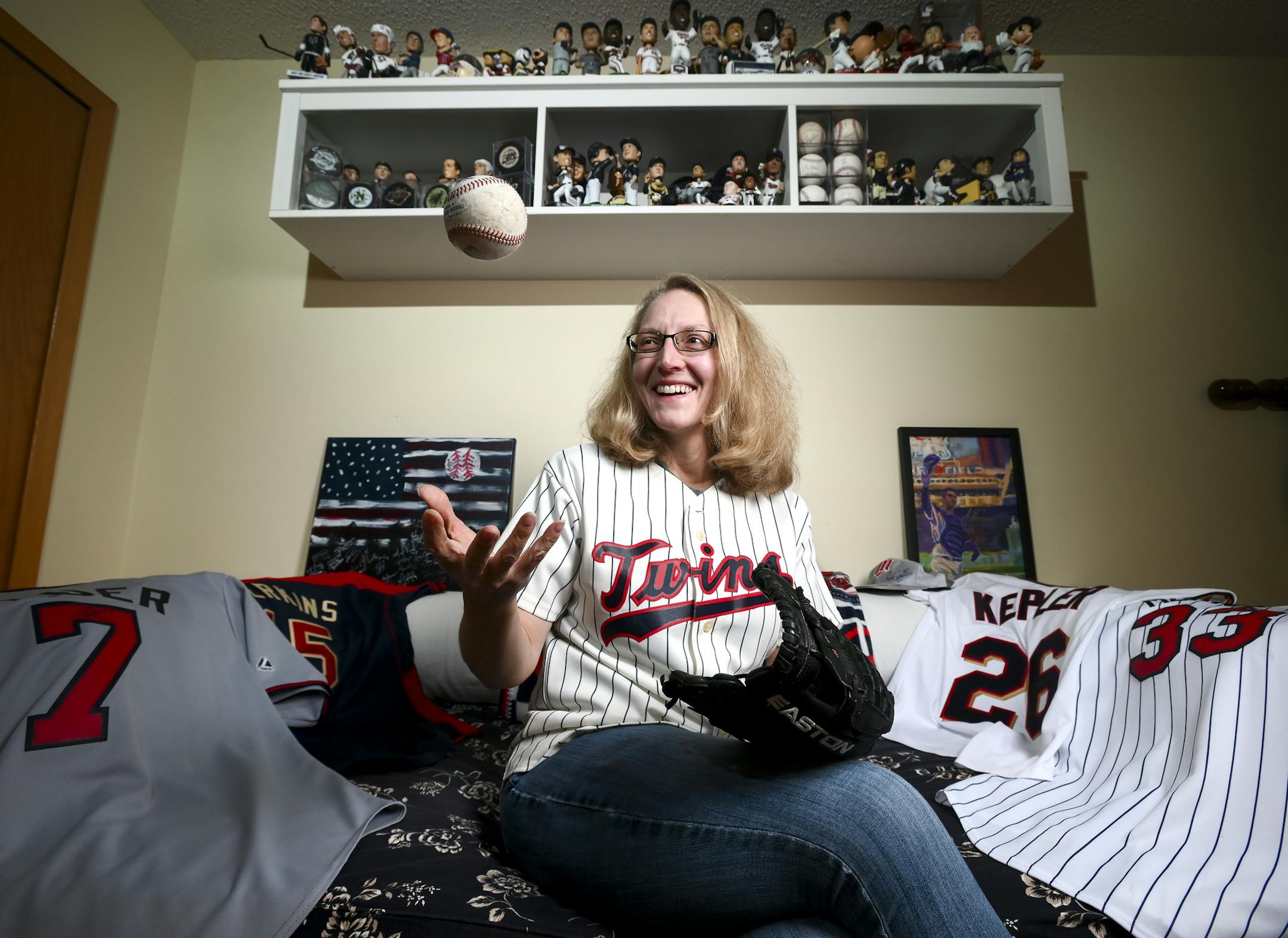 Twins superfan Mary Wadlow, shown in her Apple Valley home, believes this is the year the Twins will "slay the Yankees monster."