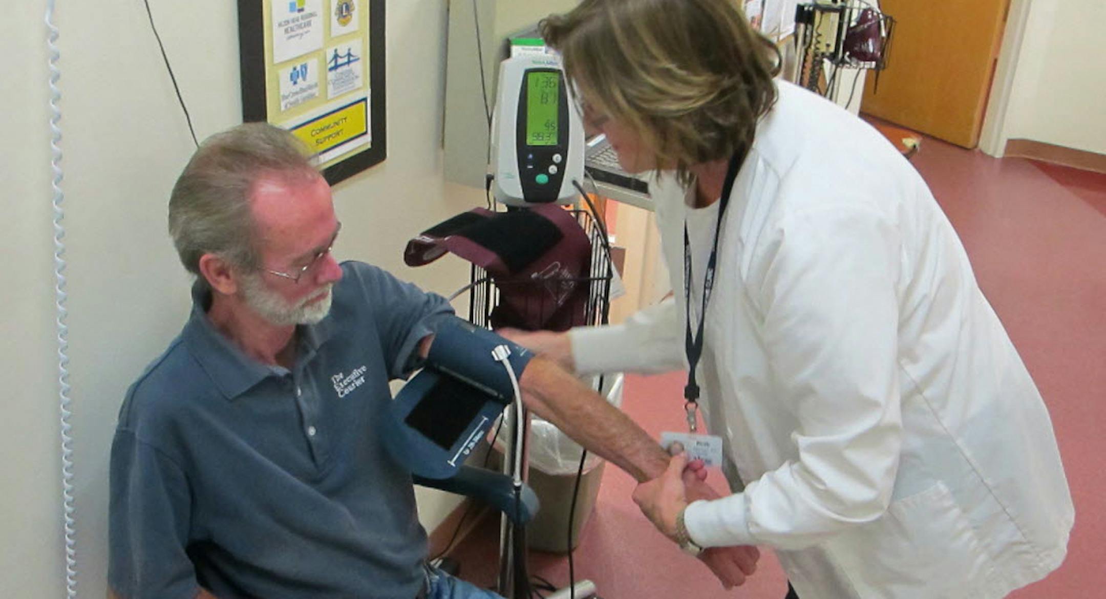 Jim Grant has his blood pressure taken by Beth Heyman at the Volunteers in Medicine Clinic on Hilton Head Island, S.C.