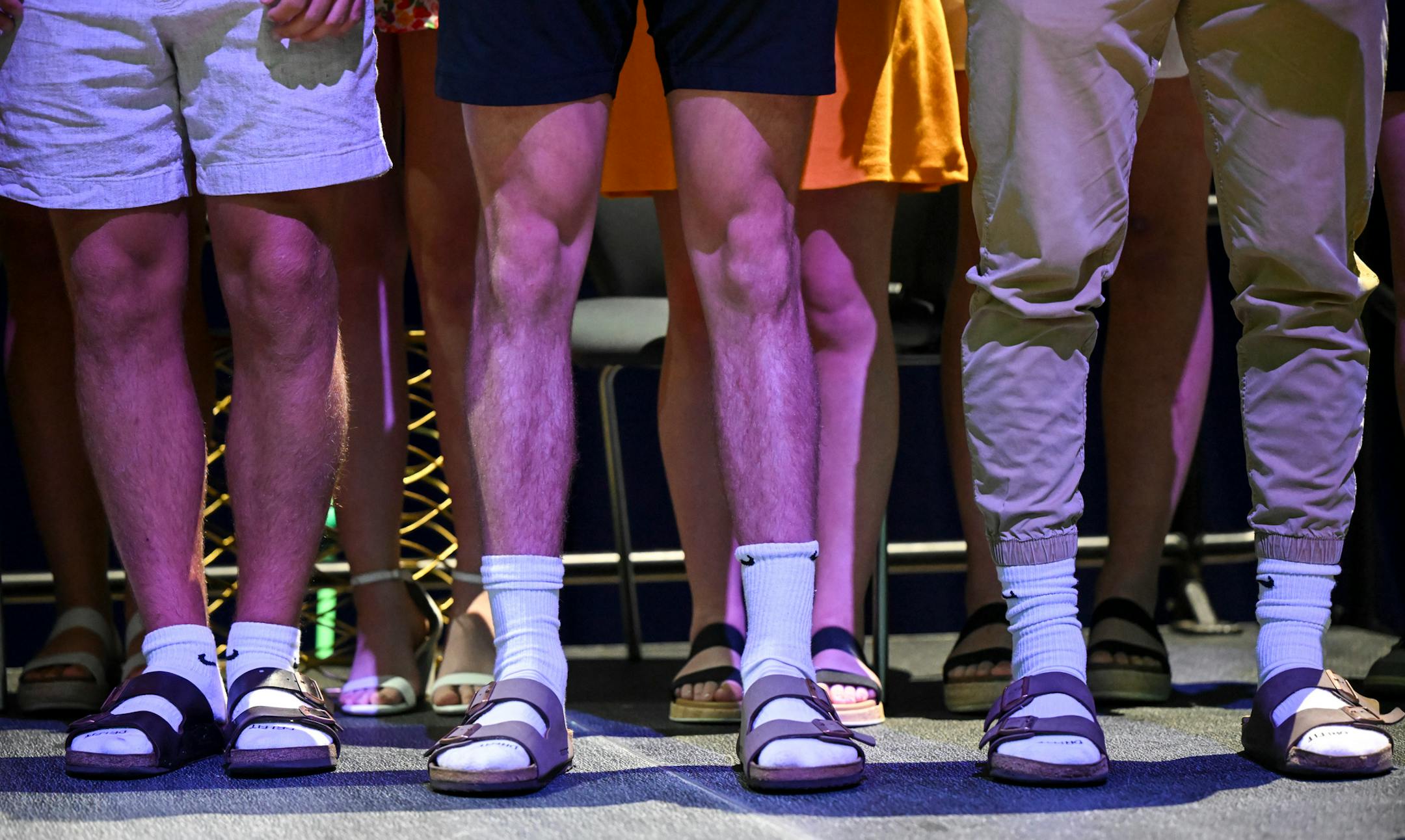 Mahtomedi boys hockey players wear matching socks and Birkenstocks during the Star Tribune's sixth annual All-Metro Sports Awards show.