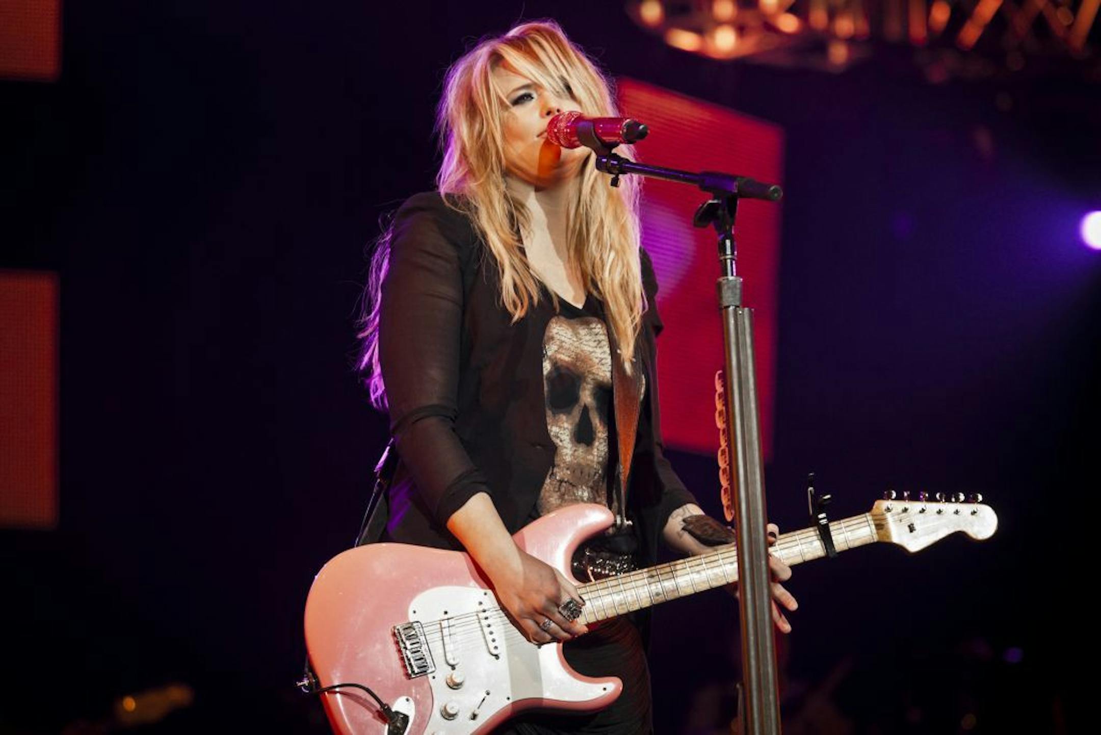 Singer-songwriter Miranda Lambert performs during her "On Fire" tour at the Izod Center in East Rutherford, N.J., Jan. 28, 2012. Lambert's tour includes songs from her new album, "Four the Record."