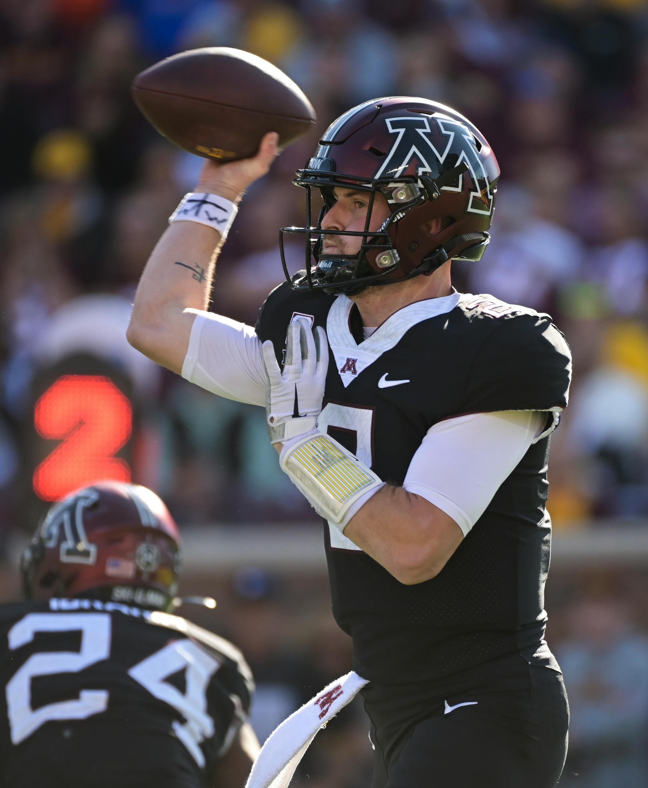 Minnesota Golden Gophers quarterback Tanner Morgan (2) throws a pass against the Rutgers Scarlet Knights during the first quarter.