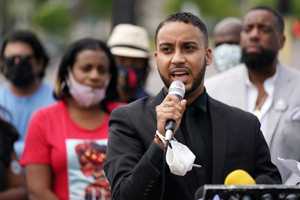 Phillipe Cunningham spoke during a news conference with fellow Council Member Jeremiah Ellison outlining their vision for reducing violence on the Nor