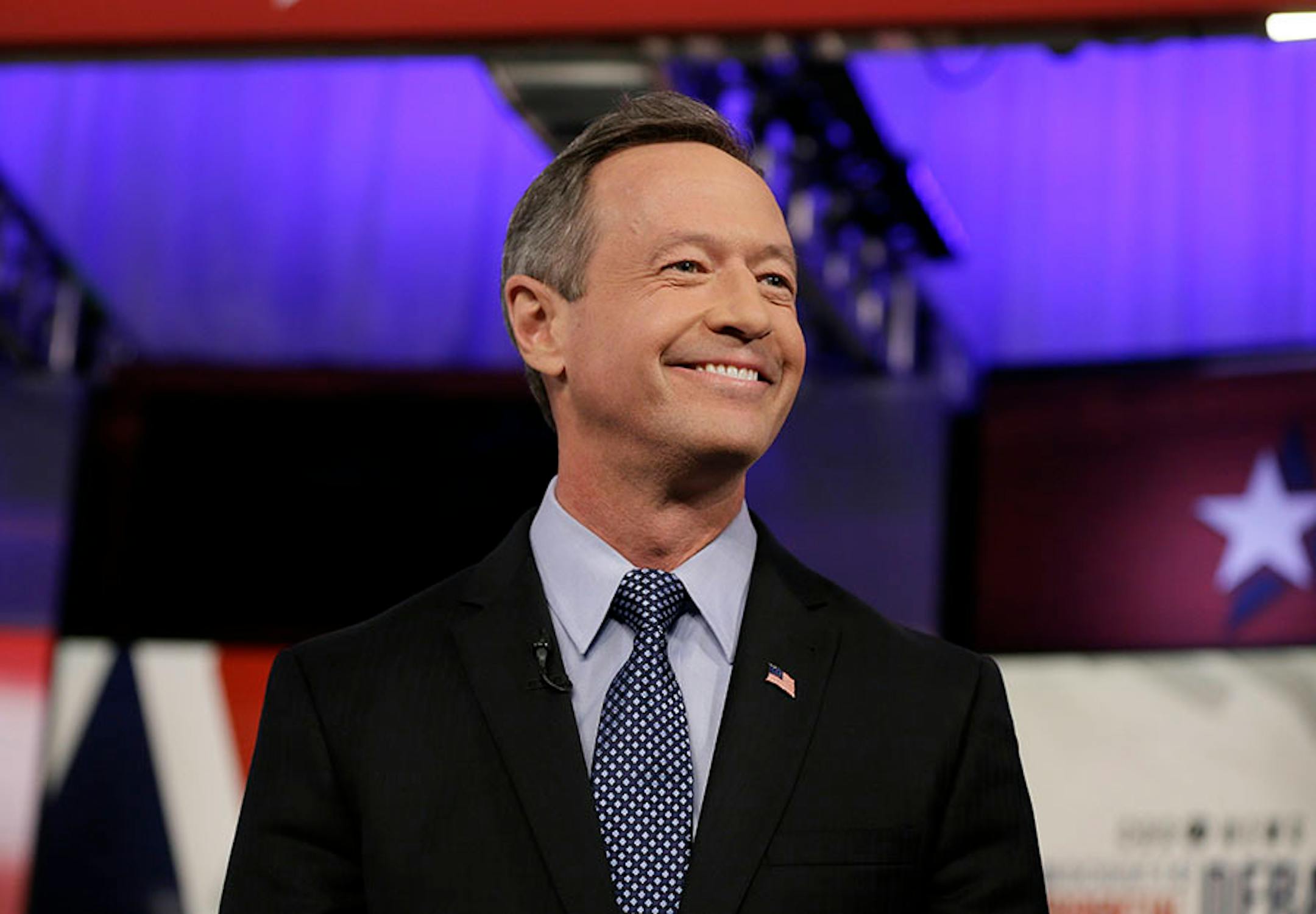 Martin O'Malley takes the stage a Democratic presidential primary debate, Saturday, Nov. 14, 2015, in Des Moines, Iowa.